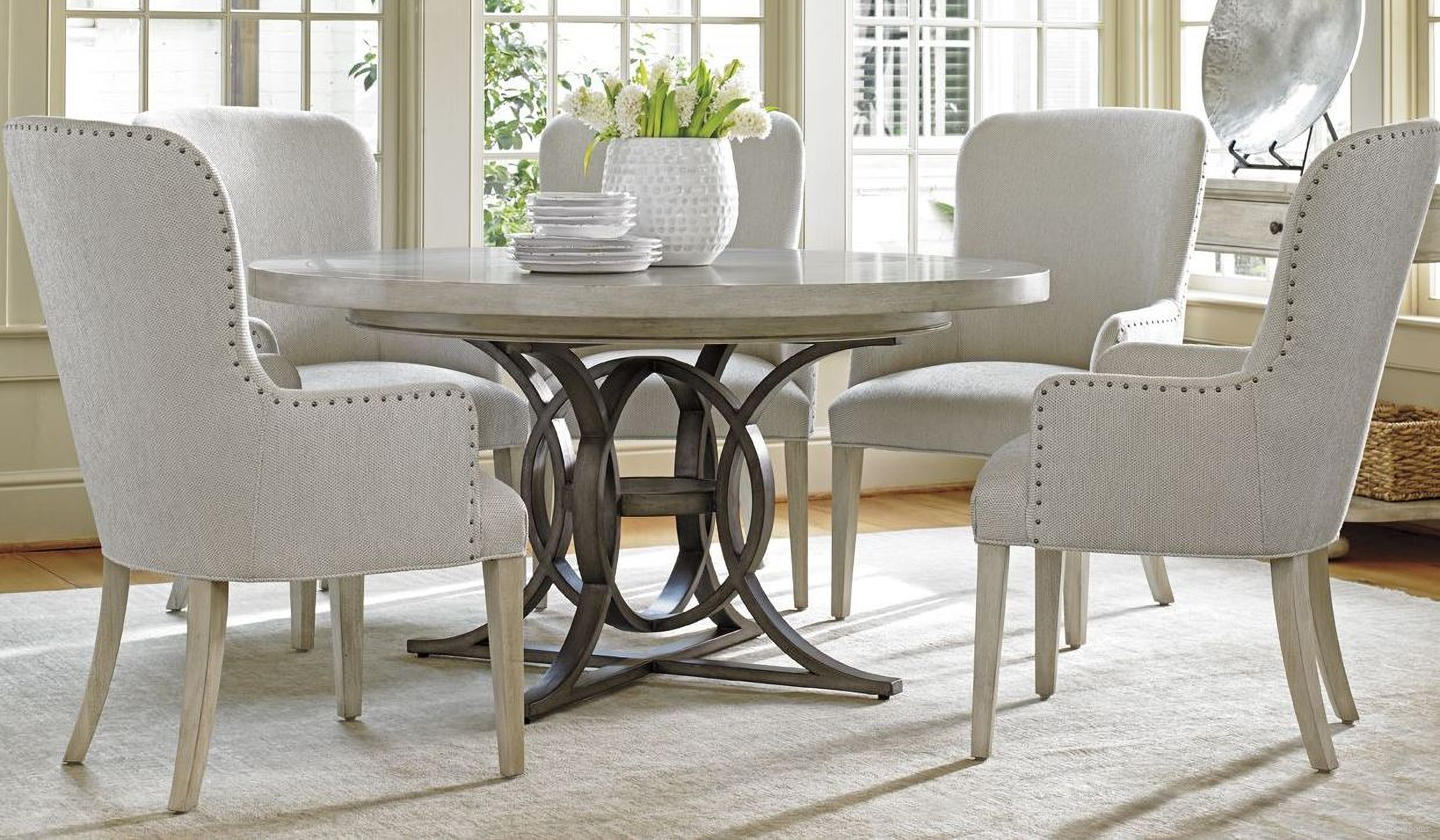 The appearance of Oyster Bay Calerton Extendable Round Dining Room Set designed by Lexington in the transitional interior design. This oyster piece of furniture was selected by 1StopBedrooms from Oyster Bay Collection to add a touch of cosiness and style into your home. Sku: 714-875C;714-882-01. Table Base Style: Pedestal. Table Top Shape: Round. Material: Wood. Size: 58".