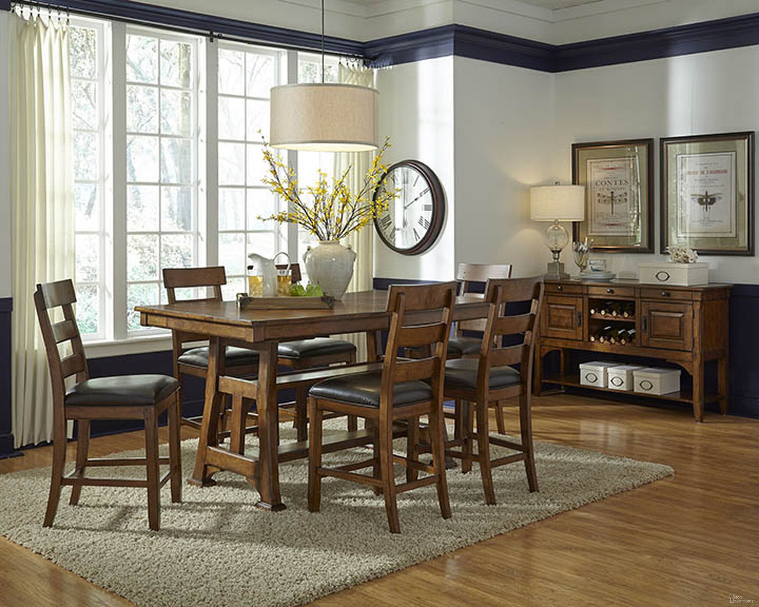 The appearance of Ozark Gathering Height Trestle Dining Room Set In Warm Pecan designed by A-America in the traditional interior design. This pecan piece of furniture  was selected by 1StopBedrooms from Ozark Collection to add a touch of cosiness and style into your home. Sku: OZAMA6720;OZAMA3252. Table Base Style: Trestle. Material: Wood. Table Top Shape: Rectangular. Size: 86" x 40".
