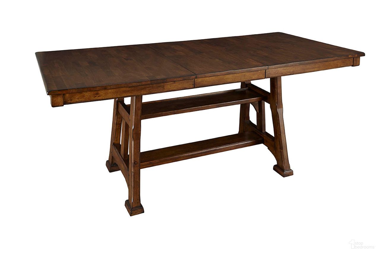 The appearance of Ozark Gathering Height Trestle Table With One Butterfly Leaf In Warm Pecan designed by A-America in the cabin / lodge interior design. This pecan piece of furniture was selected by 1StopBedrooms from Ozark Collection to add a touch of cosiness and style into your home. Sku: OZAMA6720. Table Base Style: Trestle. Material: Wood. Table Top Shape: Rectangular. Size: 86" x 40".