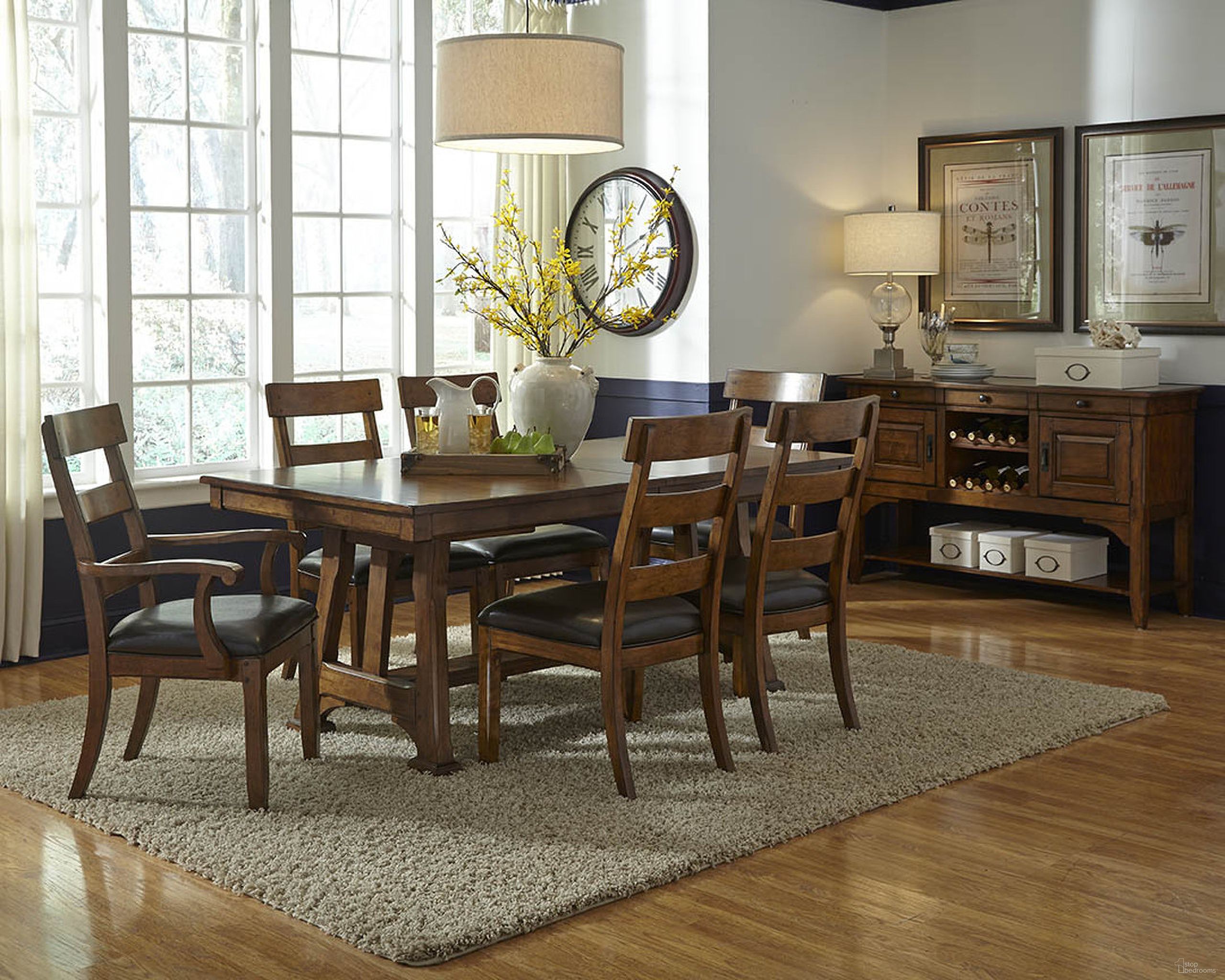 The appearance of Ozark Trestle Dining Room Set In Warm Pecan designed by A-America in the traditional interior design. This pecan piece of furniture was selected by 1StopBedrooms from Ozark Collection to add a touch of cosiness and style into your home. Sku: OZAMA6320;OZAMA2252. Table Base Style: Trestle. Material: Wood. Table Top Shape: Rectangular. Size: 92" x 40".