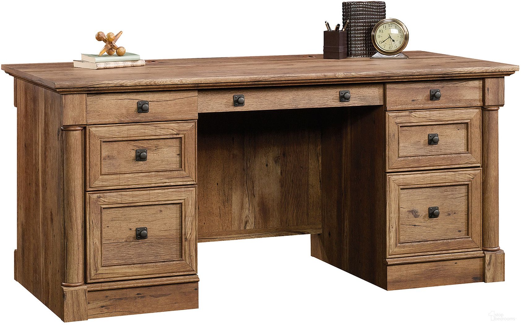 The appearance of Palladia Executive Desk In Vintage Oak designed by Sauder in the traditional interior design. This vintage oak piece of furniture was selected by 1StopBedrooms from Palladia Collection to add a touch of cosiness and style into your home. Sku: 420604. Material: Engineered Wood.