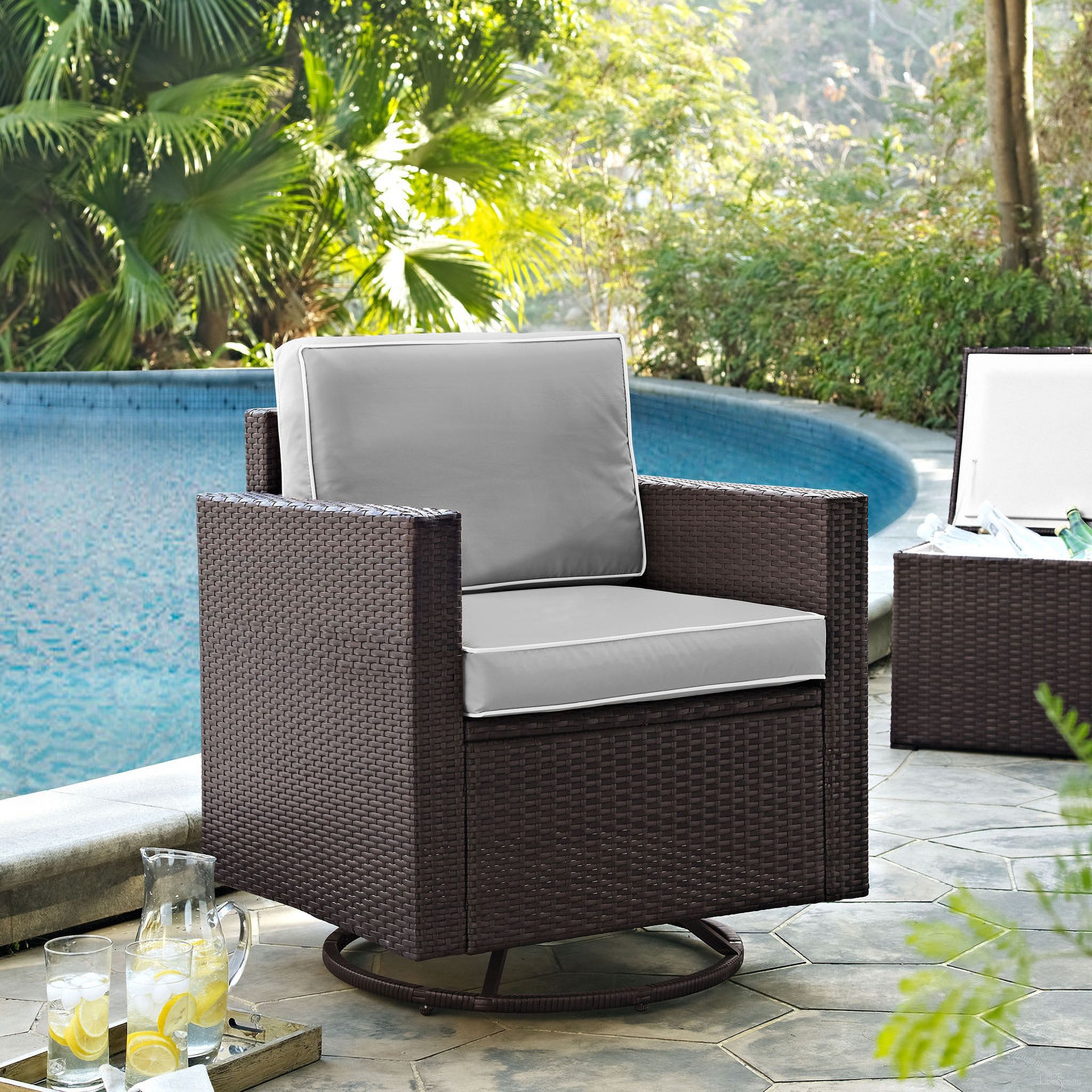 The appearance of Palm Harbor Wicker Swivel Rocker Outdoor Chair In Gray and Brown designed by Crosley Brands in the modern / contemporary interior design. This gray piece of furniture was selected by 1StopBedrooms from Palm Harbor Collection to add a touch of cosiness and style into your home. Sku: CO7152-BR;CO7403-GY. Material: Polyester.