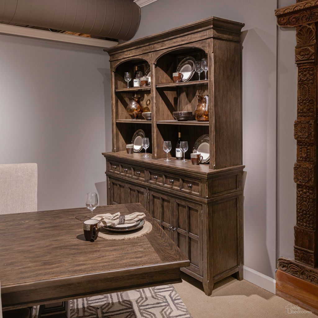 The appearance of Paradise Valley Hutch and Buffet In Saddle Brown designed by Liberty in the traditional interior design. This saddle brown piece of furniture  was selected by 1StopBedrooms from Paradise Valley Collection to add a touch of cosiness and style into your home. Sku: 297-CB6640;297-CH6848. Material: Rubberwood.