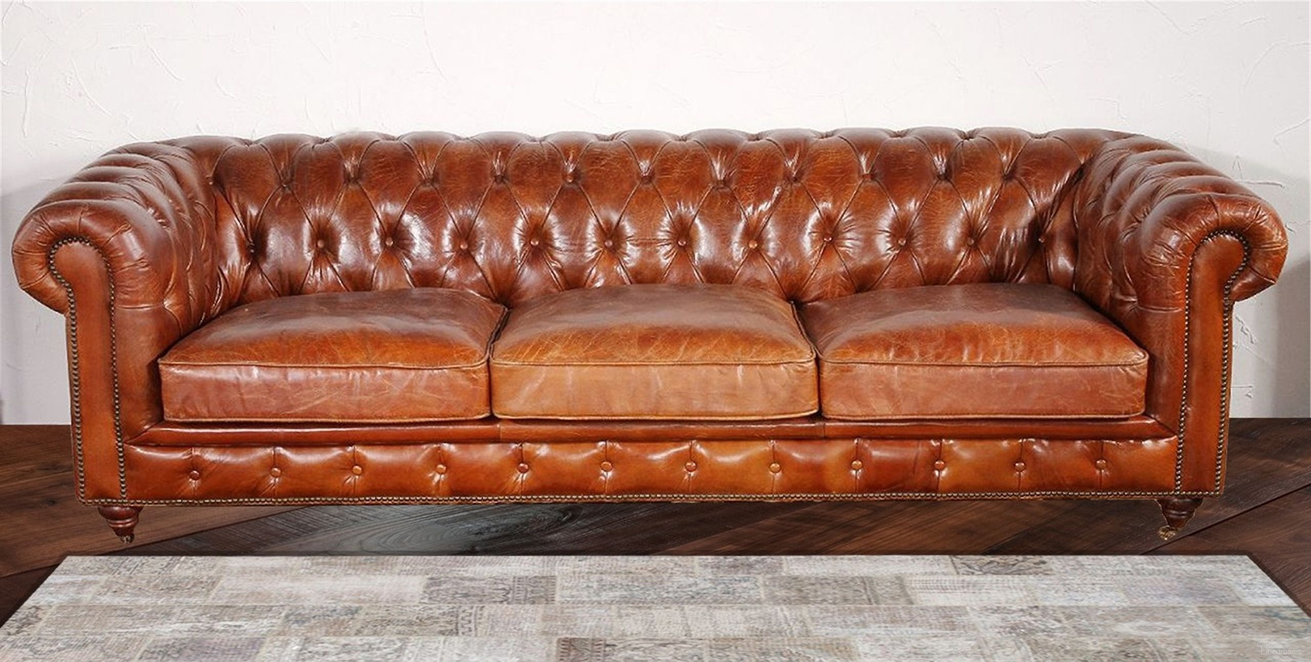 The appearance of Paris Club Top Grain Leather Tufted Chester Bay Sofa In Brown designed by Pasargad Home in the modern / contemporary interior design. This brown piece of furniture was selected by 1StopBedrooms from Paris Club Collection to add a touch of cosiness and style into your home. Sku: SOFA-3009-3. Material: Top Grain Leather.