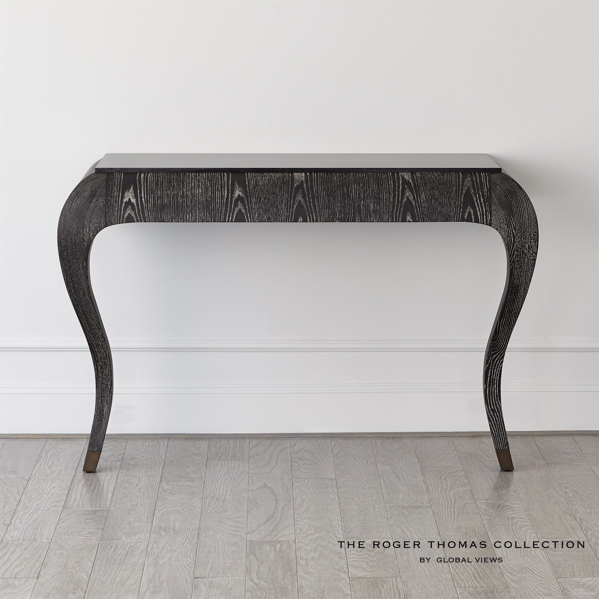 The appearance of Paris Wall Console In Black Cerused Oak designed by Global Views in the modern / contemporary interior design. This black piece of furniture was selected by 1StopBedrooms from Paris Collection to add a touch of cosiness and style into your home. Sku: RT2002. Material: Wood.