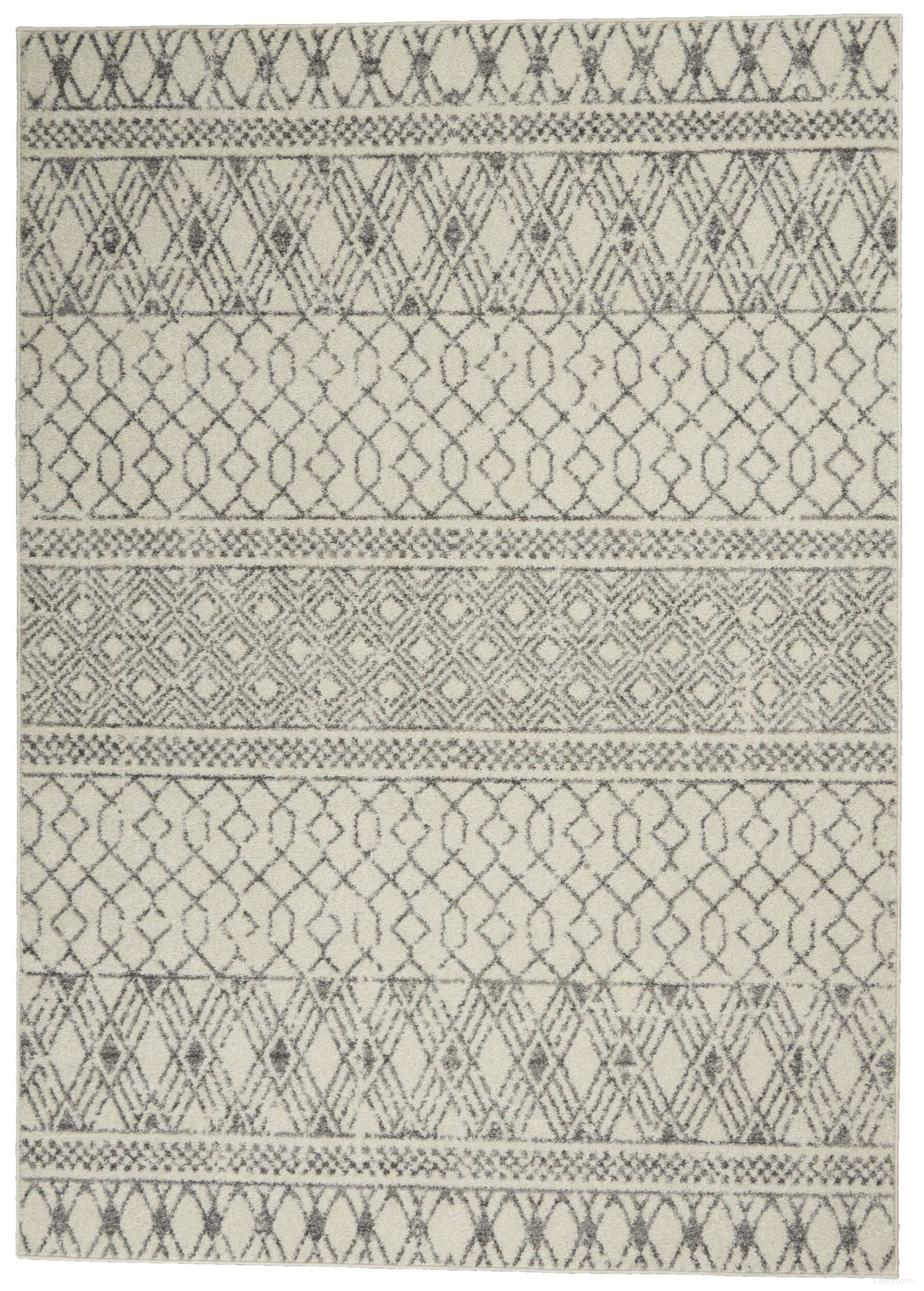 The appearance of Passion Ivory and Grey 5'3" x 7'3" Bohemian Area Rug designed by Nourison in the bohemian interior design. This ivory and grey piece of furniture was selected by 1StopBedrooms from Passion Collection to add a touch of cosiness and style into your home. Sku: 99446793706. Material: Polypropylene.