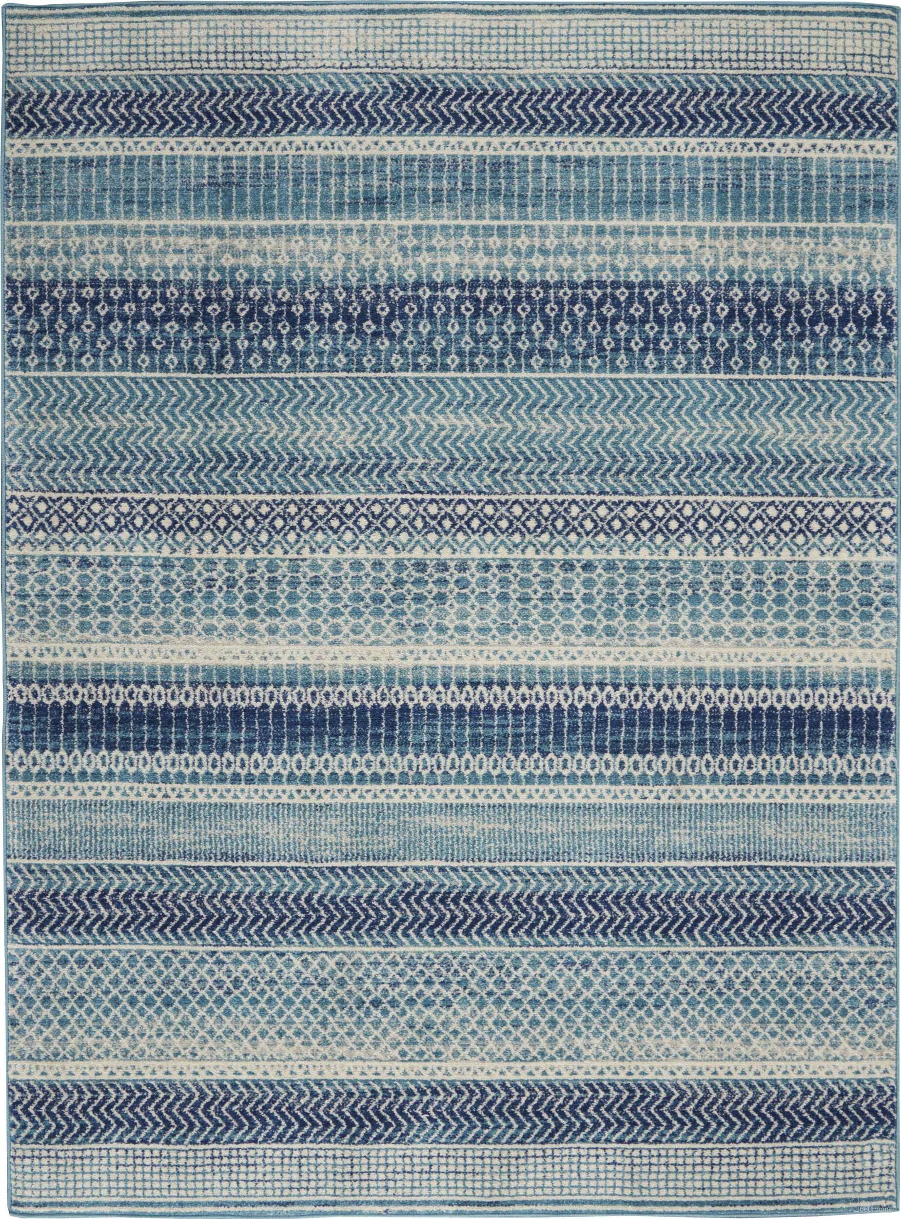 The appearance of Passion Navy Blue 3'9" x 5'9" Bohemian Area Rug designed by Nourison in the bohemian interior design. This navy blue piece of furniture  was selected by 1StopBedrooms from Passion Collection to add a touch of cosiness and style into your home. Sku: 99446765994. Material: Polypropylene.
