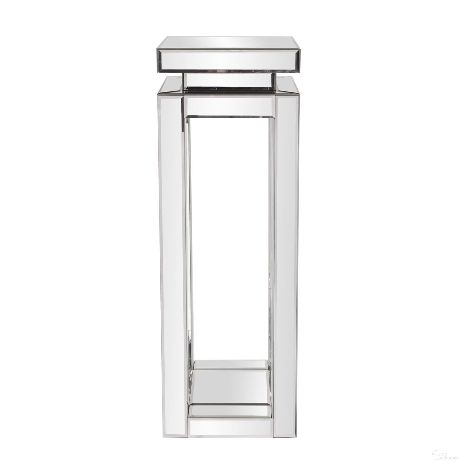The appearance of Pedestal Tall Table In Mirror designed by Howard Elliott in the modern / contemporary interior design. This mirror piece of furniture  was selected by 1StopBedrooms from  to add a touch of cosiness and style into your home. Sku: 11186. Material: Wood.