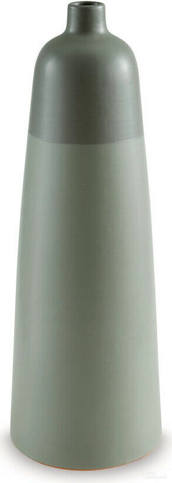 The appearance of Peerland Vase In Sage Green designed by Signature Design by Ashley in the transitional interior design. This sage green piece of furniture was selected by 1StopBedrooms from Peerland Collection to add a touch of cosiness and style into your home. Sku: A2000656. Material: Ceramic.