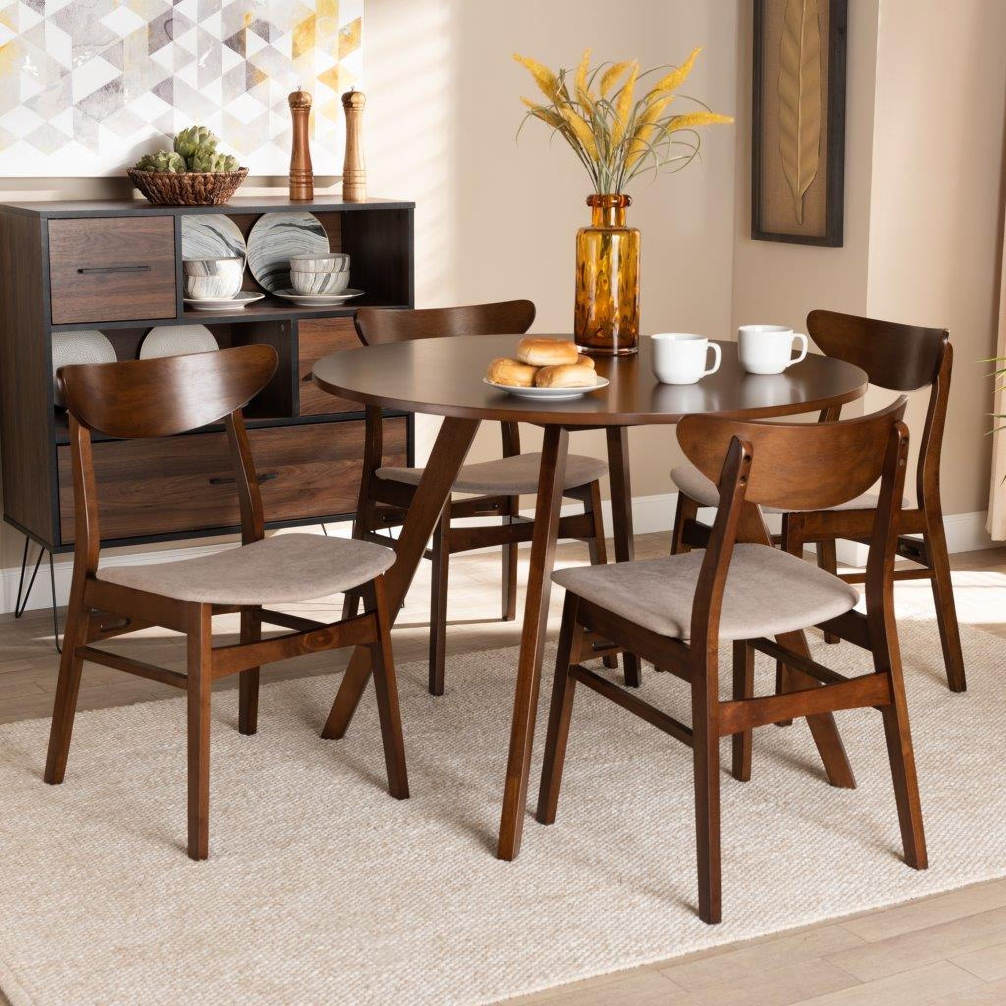 The appearance of Philip Mid-Century Modern Transitional Light Beige Fabric Upholstered and Walnut Brown Finished Wood 5-Piece Dining Set designed by Baxton Studio in the transitional interior design. This light beige piece of furniture was selected by 1StopBedrooms from Philip Collection to add a touch of cosiness and style into your home. Sku: Parlin/Hexa-Latte/Walnut-5PC Dining Set. Material: Polyester.