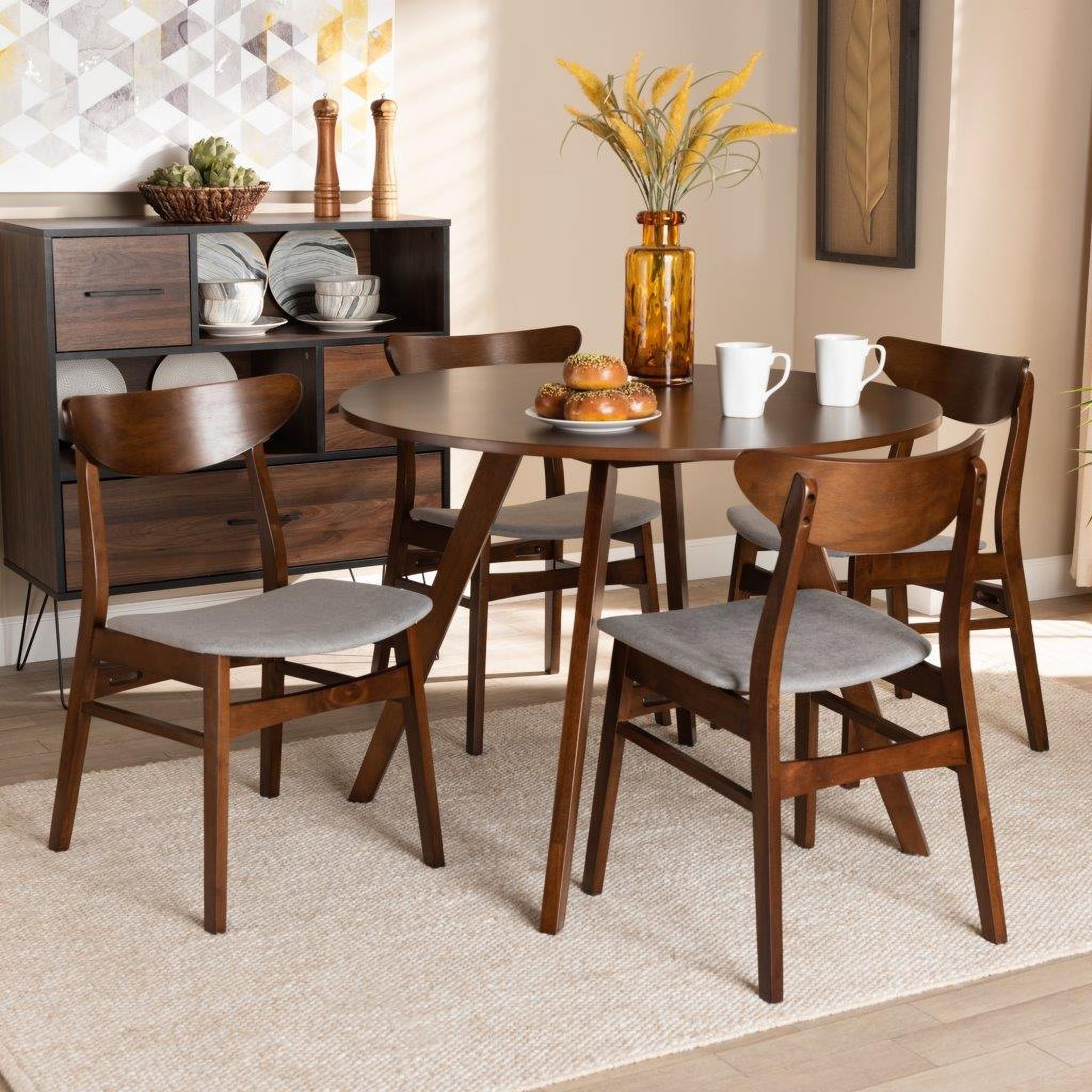 The appearance of Philip Mid-Century Modern Transitional Light Grey Fabric Upholstered and Walnut Brown Finished Wood 5-Piece Dining Set designed by Baxton Studio in the transitional interior design. This walnut brown piece of furniture was selected by 1StopBedrooms from Philip Collection to add a touch of cosiness and style into your home. Sku: Parlin/Hexa-Smoke/Walnut-5PC Dining Set. Material: Polyester.