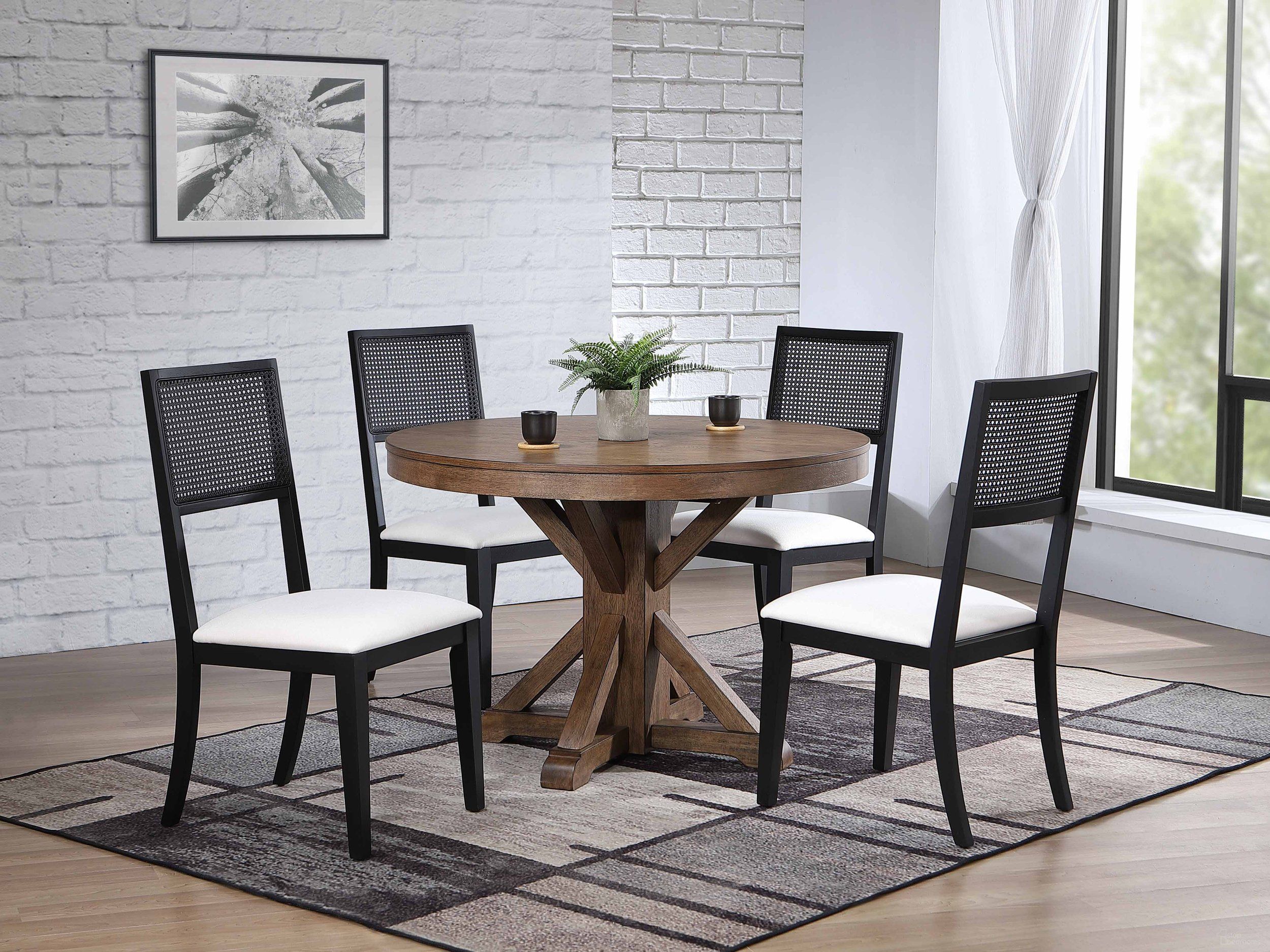 The appearance of Pierce Dining Table and Robin 5-Piece Dining Set In Dune designed by Iconic Furniture in the modern / contemporary interior design. This dune piece of furniture  was selected by 1StopBedrooms from Urbana Collection to add a touch of cosiness and style into your home. Sku: RD45PIERCECH67U01BLKDN-5PC. Table Base Style: Pedestal. Table Top Shape: Round. Material: Rubberwood.