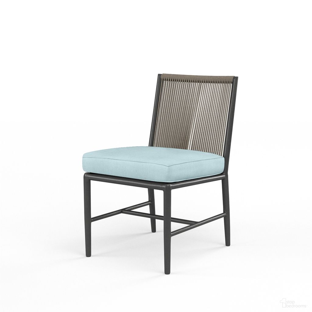 The appearance of Pietra Armless Dining Chair in Dupione Celeste designed by Sunset West in the modern / contemporary interior design. This dupione celeste piece of furniture was selected by 1StopBedrooms from Pietra Collection to add a touch of cosiness and style into your home. Sku: SW4601-1A-8067. Material: Olefin Rope.