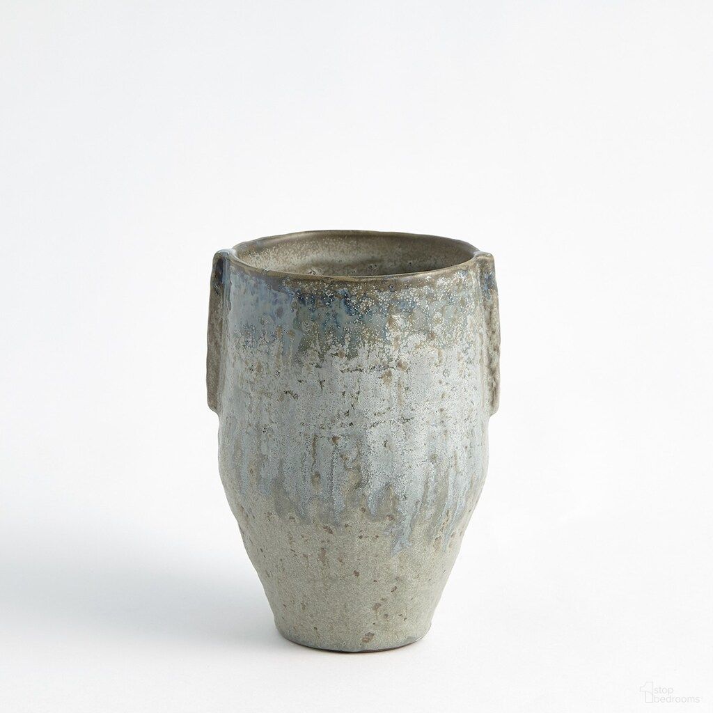 The appearance of Pinch Small Pot Vase In Seafoam designed by Global Views in the modern / contemporary interior design. This seafoam piece of furniture was selected by 1StopBedrooms from Pinch Collection to add a touch of cosiness and style into your home. Sku: 780605. Material: Ceramic.