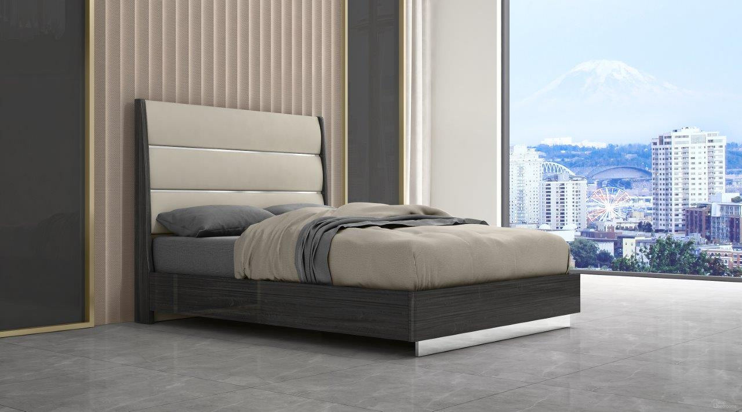 The appearance of Pino Queen Bed With High Gloss Dark Grey Faux Leather And Stainless Steel Legs designed by Whiteline Modern Living in the modern / contemporary interior design. This dark grey piece of furniture was selected by 1StopBedrooms from Pino Collection to add a touch of cosiness and style into your home. Sku: BQ1752-DGRY/LGRY. Bed Type: Panel Bed. Bed Size: Queen. Material: Stainless Steel.