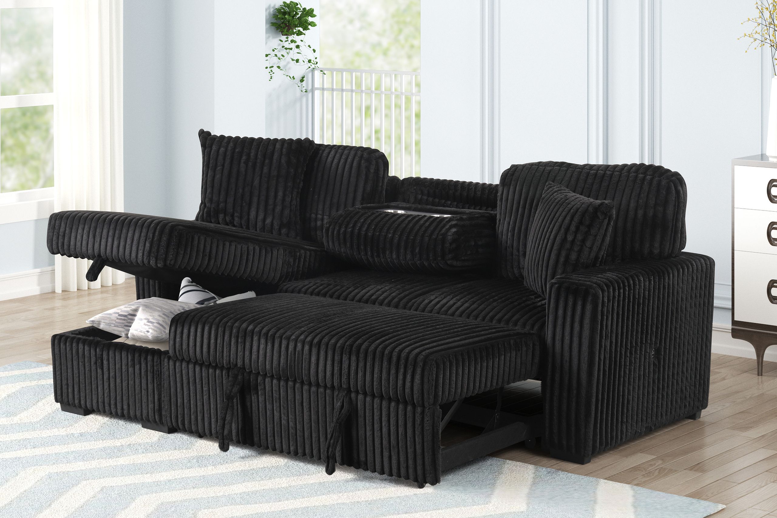 The appearance of Plush Sleeper Sectional In Black designed by Galaxy Home Furnishings in the modern / contemporary interior design. This black piece of furniture was selected by 1StopBedrooms from Plush Collection to add a touch of cosiness and style into your home. Sku: 601955556385-1;601955556385-2. Material: Corduroy.