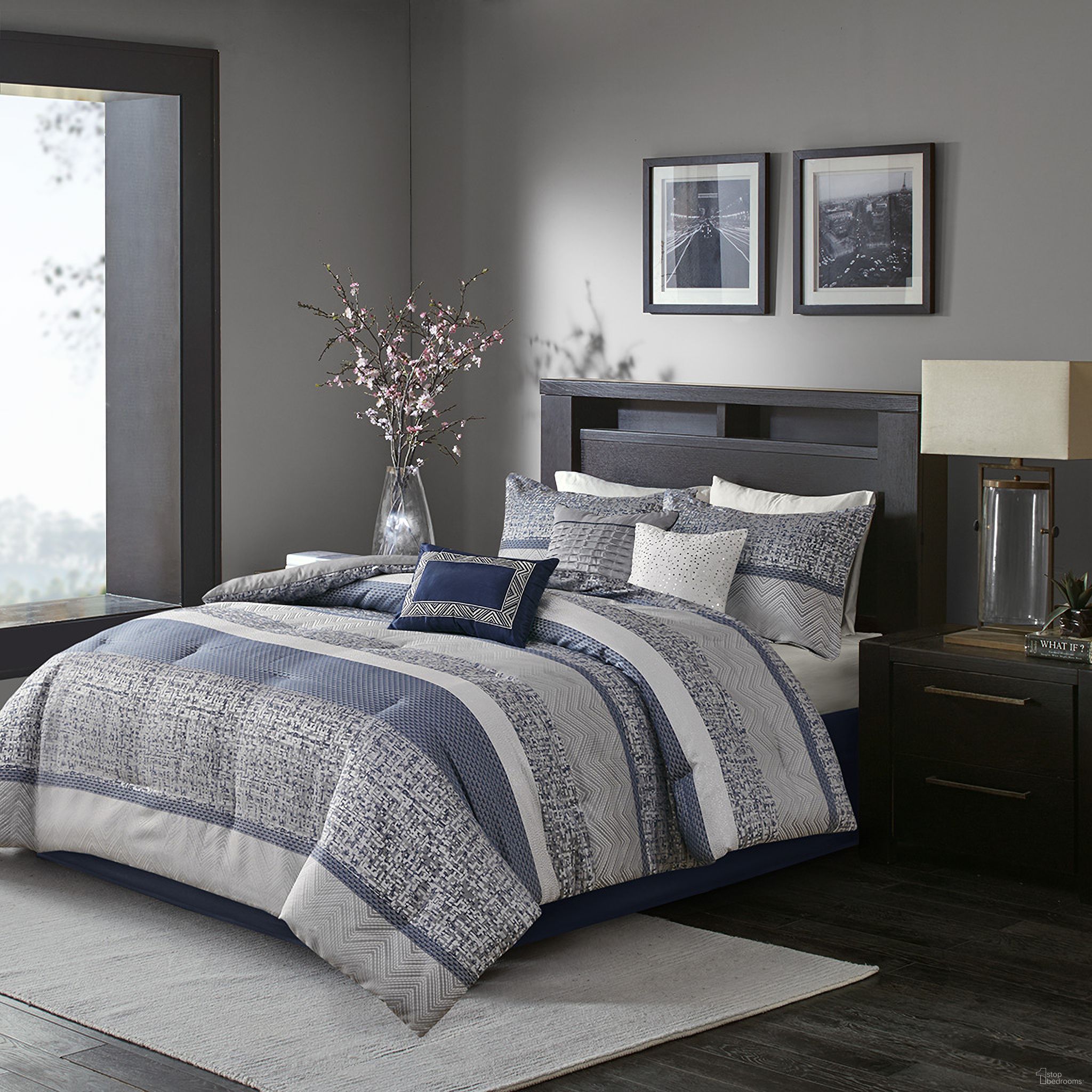 The appearance of Polyester Jacquard 7 Piece King Comforter Set In Navy designed by Olliix in the transitional interior design. This navy piece of furniture was selected by 1StopBedrooms from Rhapsody Collection to add a touch of cosiness and style into your home. Sku: MP10-7421. Material: Polyester. Bed Size: King.