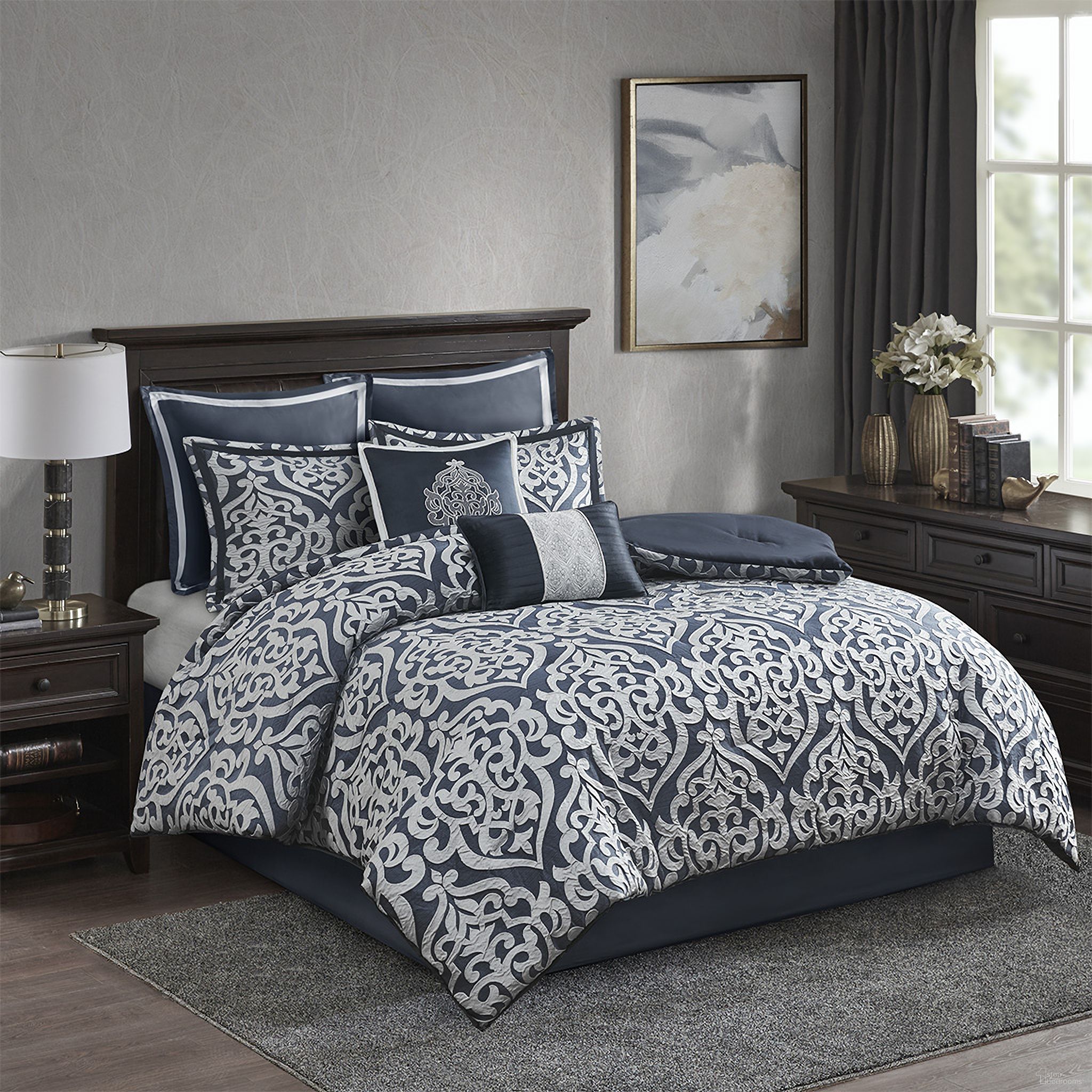 The appearance of Polyester Jacquard 8 Piece California King Comforter Set In Navy designed by Olliix in the traditional interior design. This navy piece of furniture  was selected by 1StopBedrooms from Odette Collection to add a touch of cosiness and style into your home. Sku: MP10-6838. Material: Polyester. Bed Size: California King.