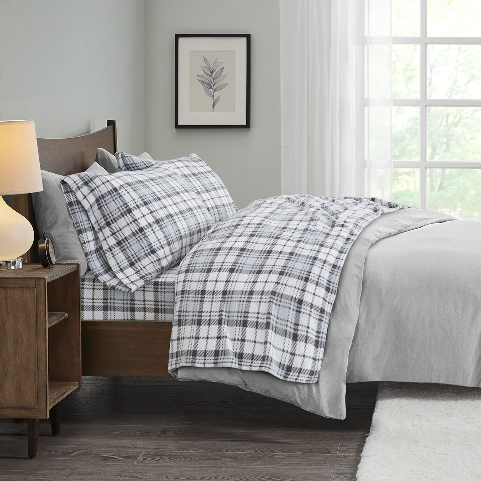 The appearance of Polyester Knitted Micro Fleece Printed 4 Piece King Sheet Set In Grey Plaid designed by Olliix in the transitional interior design. This grey plaid piece of furniture was selected by 1StopBedrooms from Micro Fleece Collection to add a touch of cosiness and style into your home. Sku: SHET20-999. Material: Polyester. Bed Size: King.