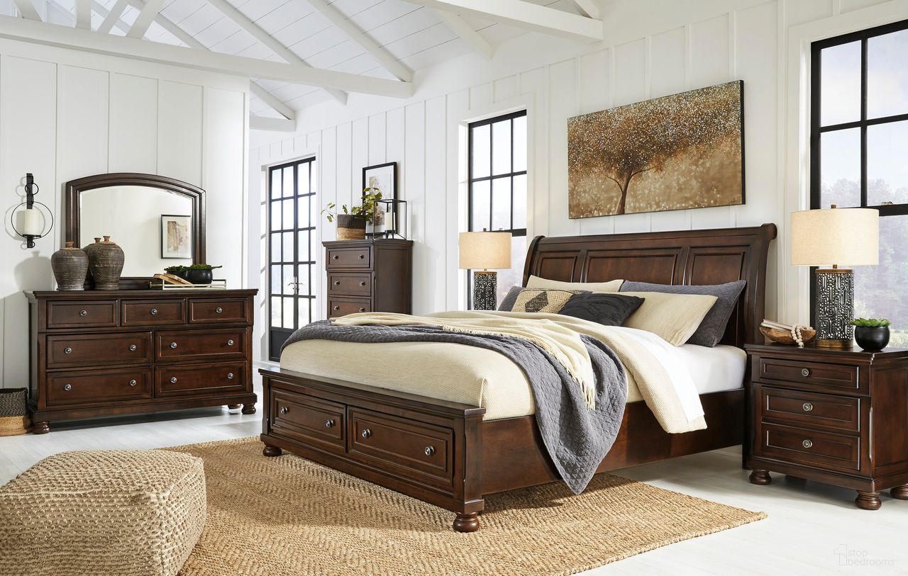 The appearance of Porter Sleigh Storage Bedroom Set In Rustic Brown designed by Signature Design by Ashley in the transitional interior design. This rustic brown piece of furniture was selected by 1StopBedrooms from Porter Collection to add a touch of cosiness and style into your home. Sku: B697-174;B697-177;B697-298;B697-92. Material: Wood. Bed Size: King.