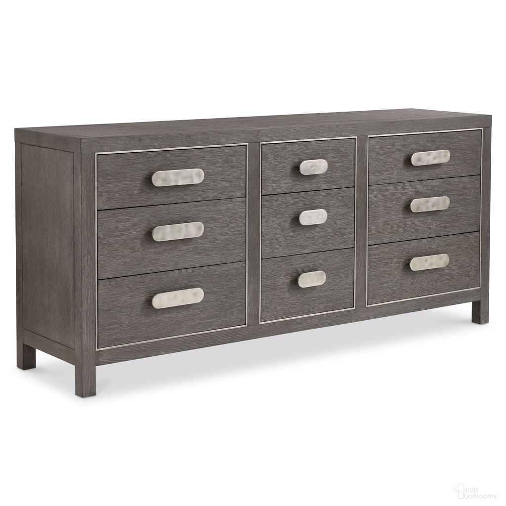 The appearance of Prado Dresser in Porcini Finish designed by Bernhardt in the modern / contemporary interior design. This porcini/bright graphite piece of furniture was selected by 1StopBedrooms from Prado Collection to add a touch of cosiness and style into your home. Sku: 324052B. Material: Wood.