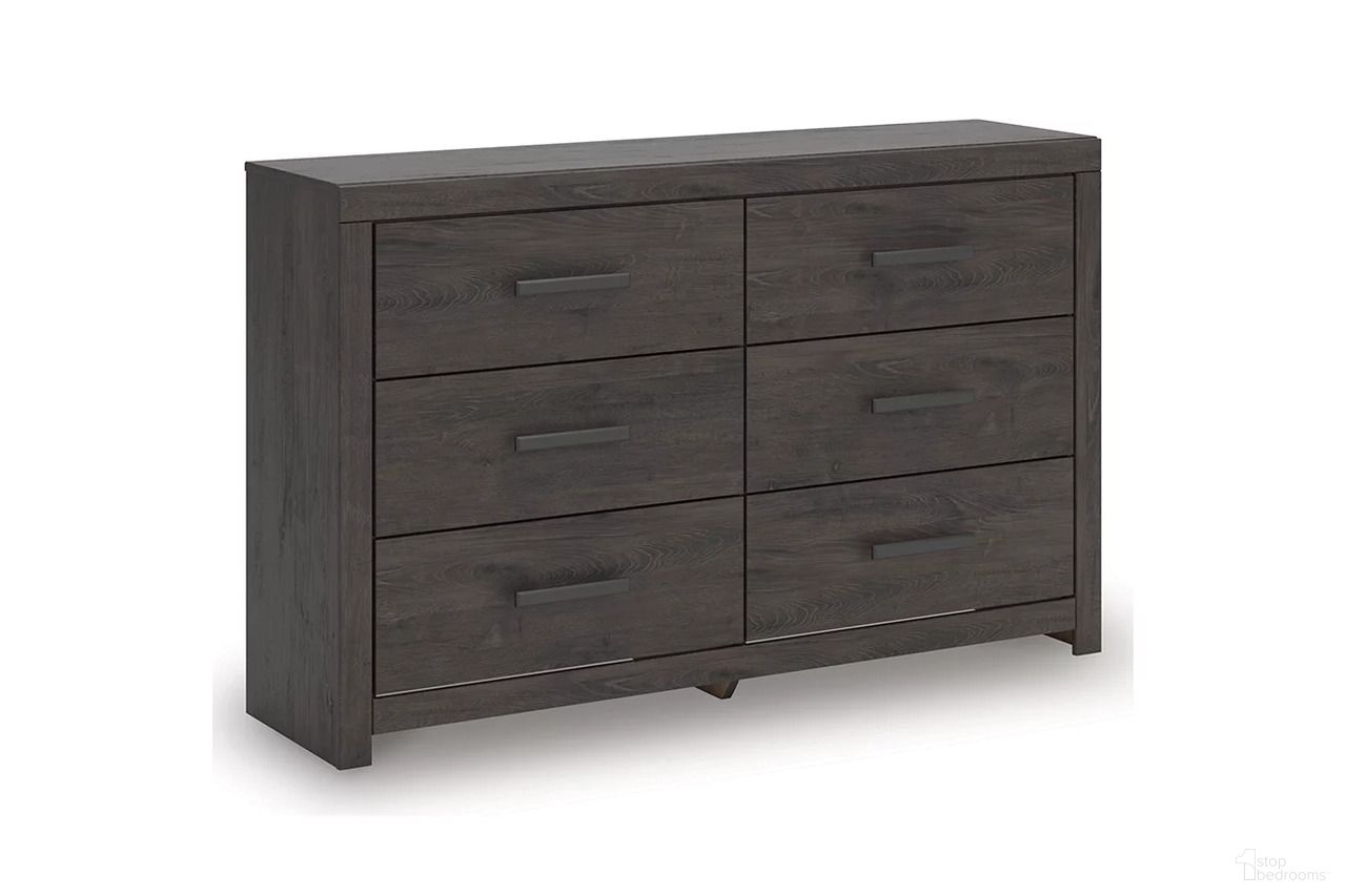 The appearance of Prendonea Dresser In Charcoal designed by Signature Design by Ashley in the transitional interior design. This charcoal piece of furniture was selected by 1StopBedrooms from Prendonea Collection to add a touch of cosiness and style into your home. Sku: B3789-31. Material: Wood.