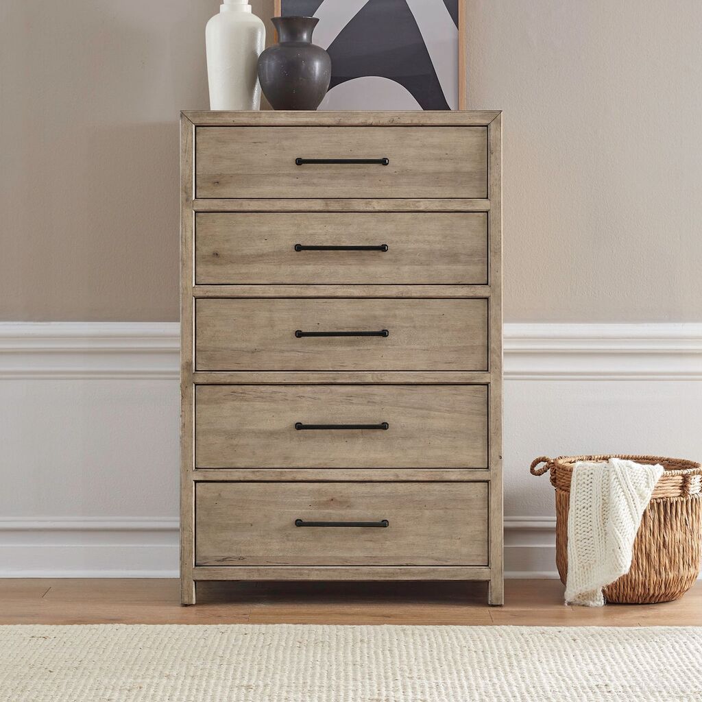 The appearance of Proximity Place 5 Drawer Chest In Barley Buff designed by Liberty in the transitional interior design. This barley buff piece of furniture was selected by 1StopBedrooms from Proximity Place Collection to add a touch of cosiness and style into your home. Sku: 780-BR41. Material: Solid Rubberwood.