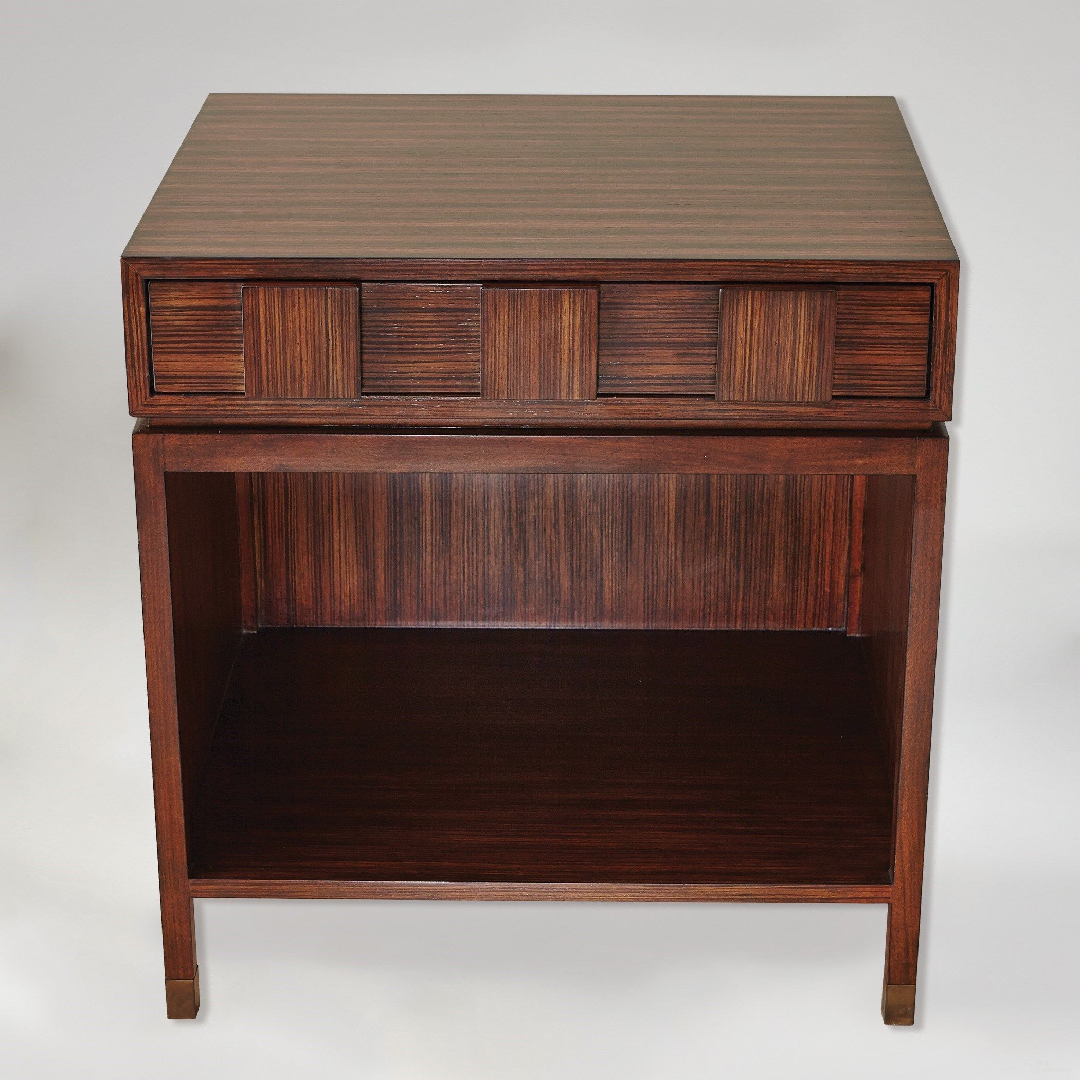 The appearance of Quad Block Bedside Table In Brown designed by Global Views in the modern / contemporary interior design. This brown piece of furniture  was selected by 1StopBedrooms from Quad Collection to add a touch of cosiness and style into your home. Sku: 2559. Material: MDF.