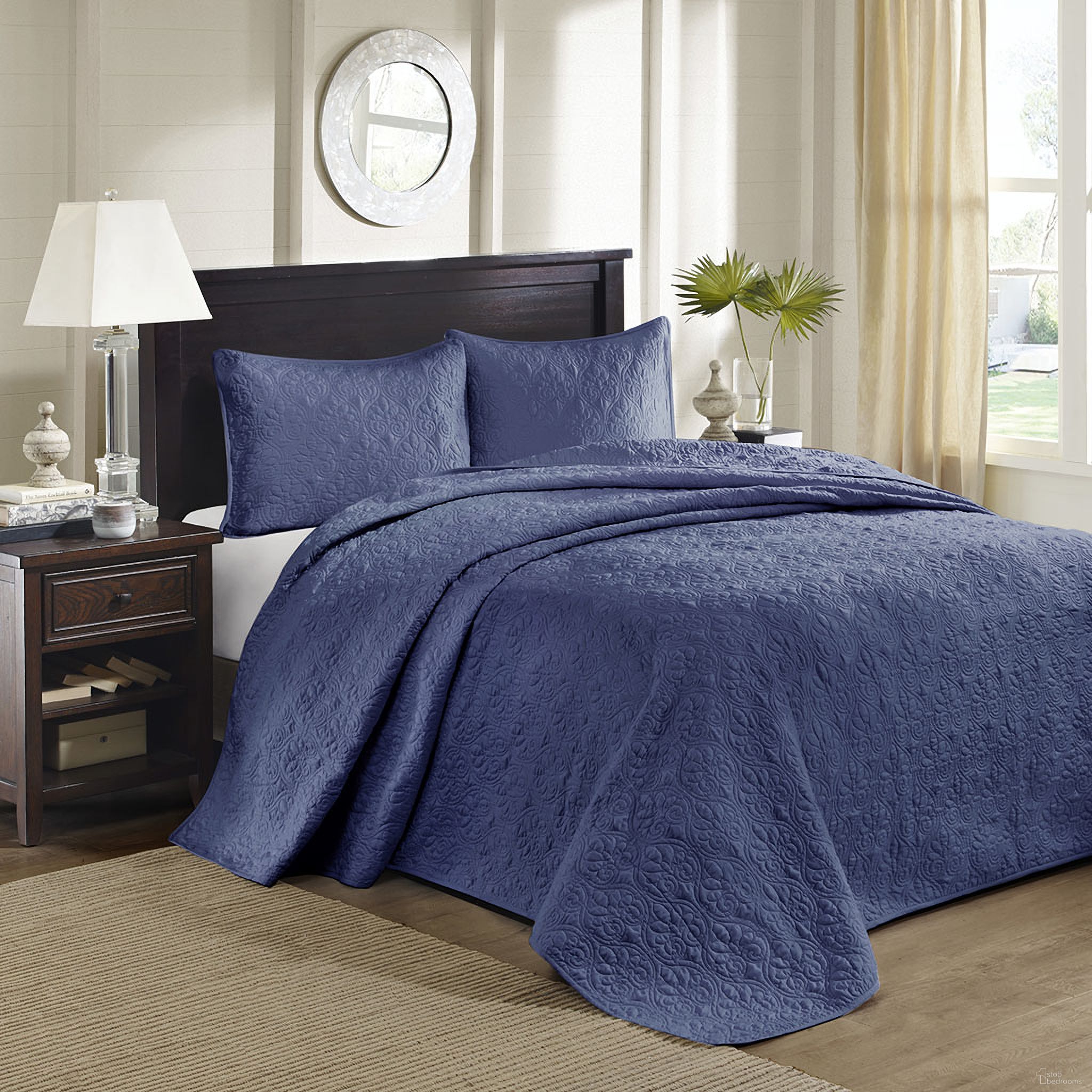 The appearance of Quebec Polyester Quilted Microfiber Reversible Mini 3 Piece King Bedspread Set In Navy designed by Olliix in the transitional interior design. This navy piece of furniture was selected by 1StopBedrooms from Quebec Collection to add a touch of cosiness and style into your home. Sku: MP13-2992. Bed Size: King. Material: Cotton.