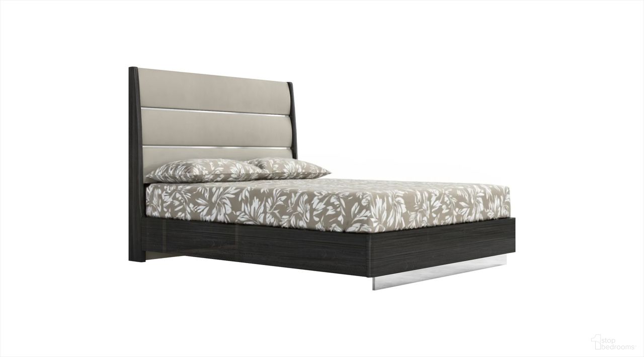 The appearance of Queen High Gloss Bed Frame with Faux Leather Headboard In Dark Grey designed by Homeroots in the modern / contemporary interior design. This dark grey piece of furniture  was selected by 1StopBedrooms from  to add a touch of cosiness and style into your home. Sku: 486096. Material: Faux Leather. Bed Size: Queen.