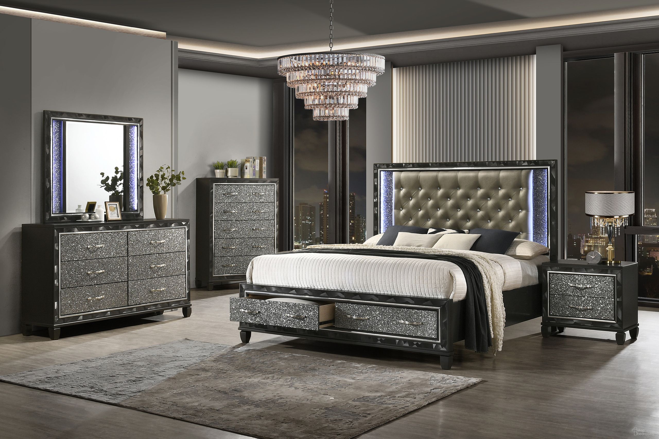 The appearance of Radiance Storage Bedroom Set In Black designed by New Classic in the glam interior design. This black piece of furniture  was selected by 1StopBedrooms from Radiance Collection to add a touch of cosiness and style into your home. Sku: B976K-310;B976K-328;B976K-338;B976K-040. Bed Type: Storage Bed. Material: Wood. Bed Size: Queen.
