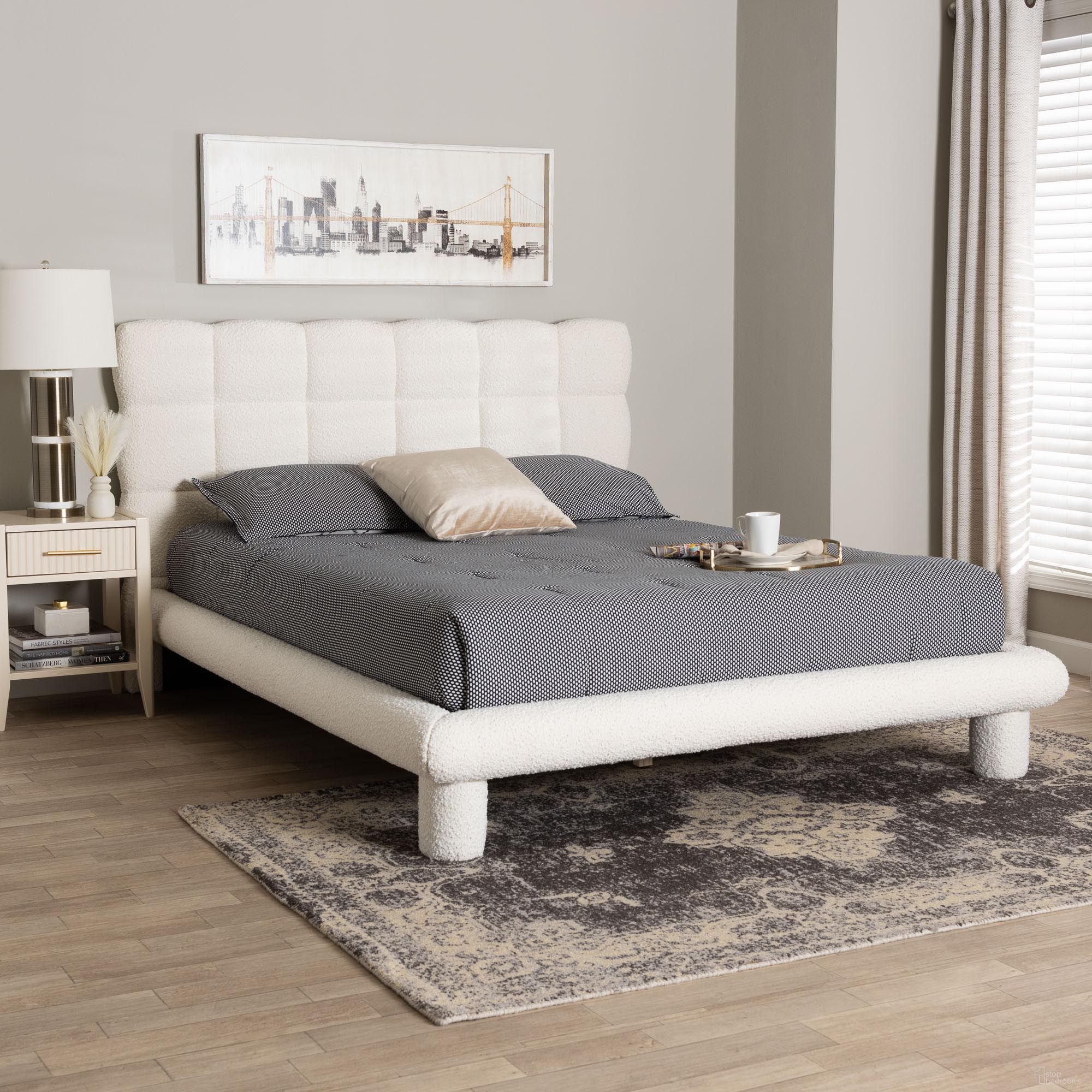The appearance of Ralayna Boucle Fabric Queen Bed In Ivory designed by Baxton Studio in the modern / contemporary interior design. This ivory piece of furniture was selected by 1StopBedrooms from Ralayna Collection to add a touch of cosiness and style into your home. Sku: BBT61168 A1-Ivory-Queen. Bed Type: Platform Bed. Bed Size: Queen. Material: Rubberwood.
