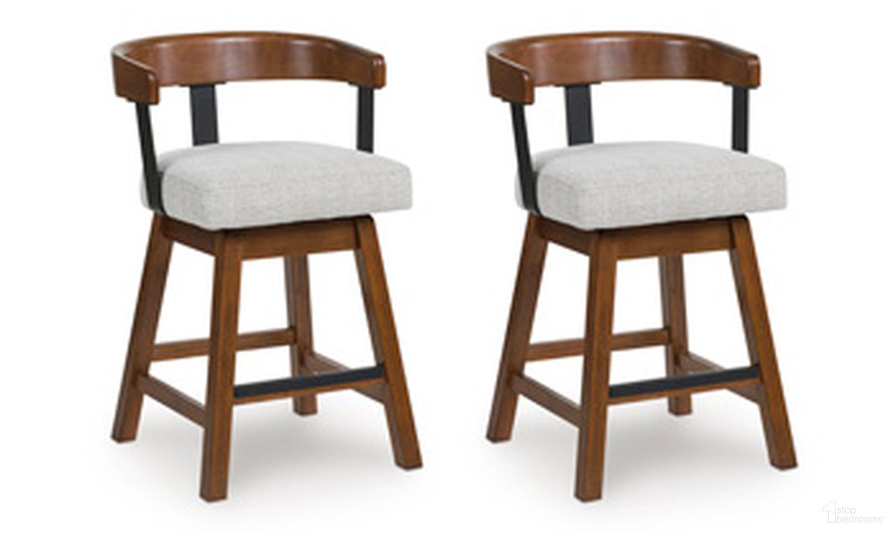 The appearance of Ralene Counter Height Barstool Set of 2 In Medium Brown designed by Signature Design by Ashley in the transitional interior design. This medium brown piece of furniture was selected by 1StopBedrooms from Ralene Collection to add a touch of cosiness and style into your home. Sku: D594-224. Material: Fabric.