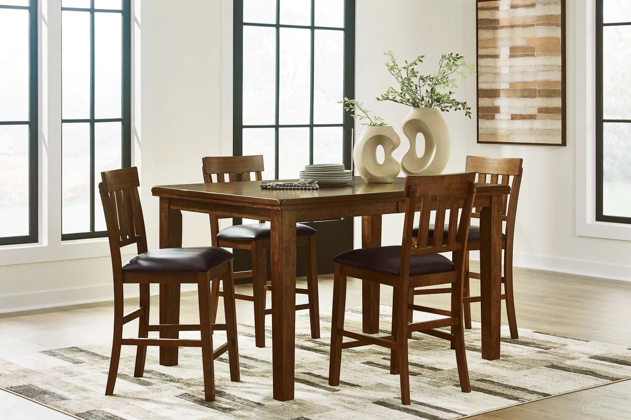 The appearance of Ralene Counter Height Dining Room Set In Medium Brown designed by Signature Design by Ashley in the transitional interior design. This medium brown piece of furniture was selected by 1StopBedrooms from Ralene Collection to add a touch of cosiness and style into your home. Sku: D594-32;D594-124;D594-124. Table Base Style: Legs. Material: Leather Match. Table Top Shape: Rectangular.