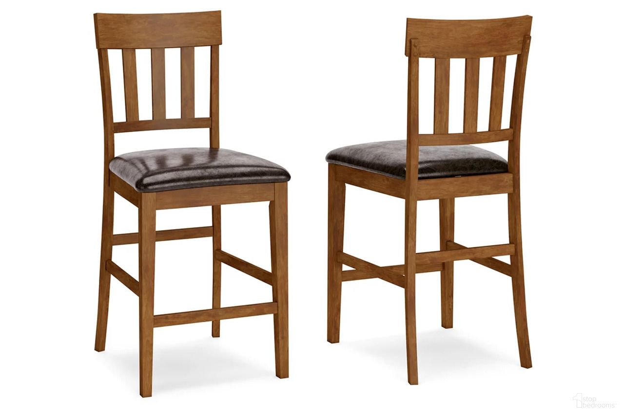 The appearance of Ralene Upholstered Counter Stool Set of 2 designed by Signature Design by Ashley in the transitional interior design. This medium brown piece of furniture  was selected by 1StopBedrooms from Ralene Collection to add a touch of cosiness and style into your home. Sku: D594-124. Material: Leather Match.