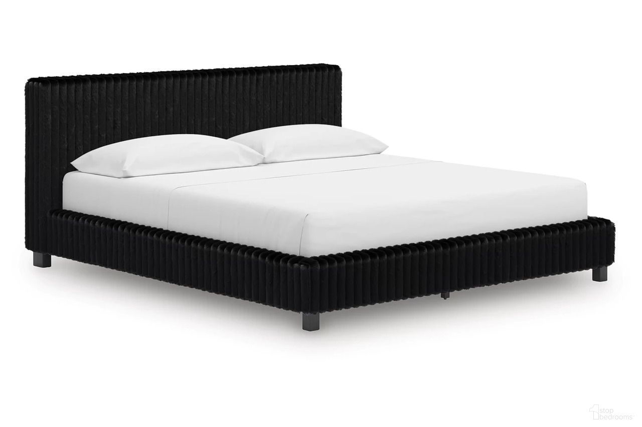 The appearance of Ravalori California King Upholstered Bed In Black designed by Signature Design by Ashley in the modern / contemporary interior design. This black piece of furniture was selected by 1StopBedrooms from Ravalori Collection to add a touch of cosiness and style into your home. Sku: NCB3380-82;NCB3380-94. Bed Size: California King. Bed Type: Upholstered Bed.