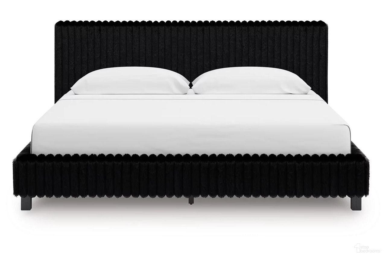 The appearance of Ravalori King Upholstered Bed In Black designed by Signature Design by Ashley in the modern / contemporary interior design. This black piece of furniture was selected by 1StopBedrooms from Ravalori Collection to add a touch of cosiness and style into your home. Sku: NCB3380-82;NCB3380-99. Bed Size: King. Bed Type: Upholstered Bed.