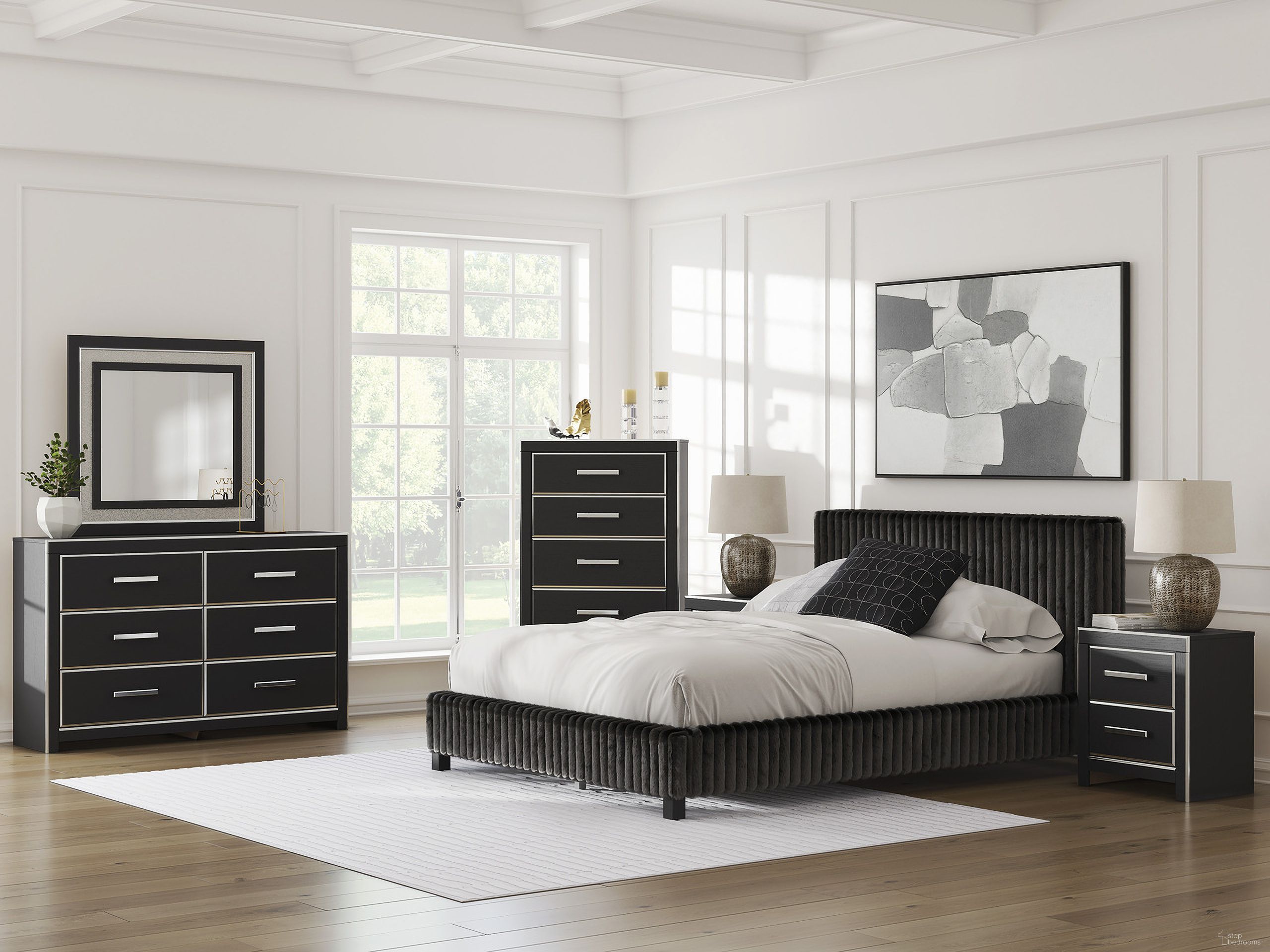 The appearance of Ravalori Upholstered Bedroom Set In Black designed by Signature Design by Ashley in the modern / contemporary interior design. This black piece of furniture was selected by 1StopBedrooms from Ravalori Collection to add a touch of cosiness and style into your home. Sku: NCB3380-81;NCB3380-99;NCB3380-92. Material: Wood. Bed Size: King.