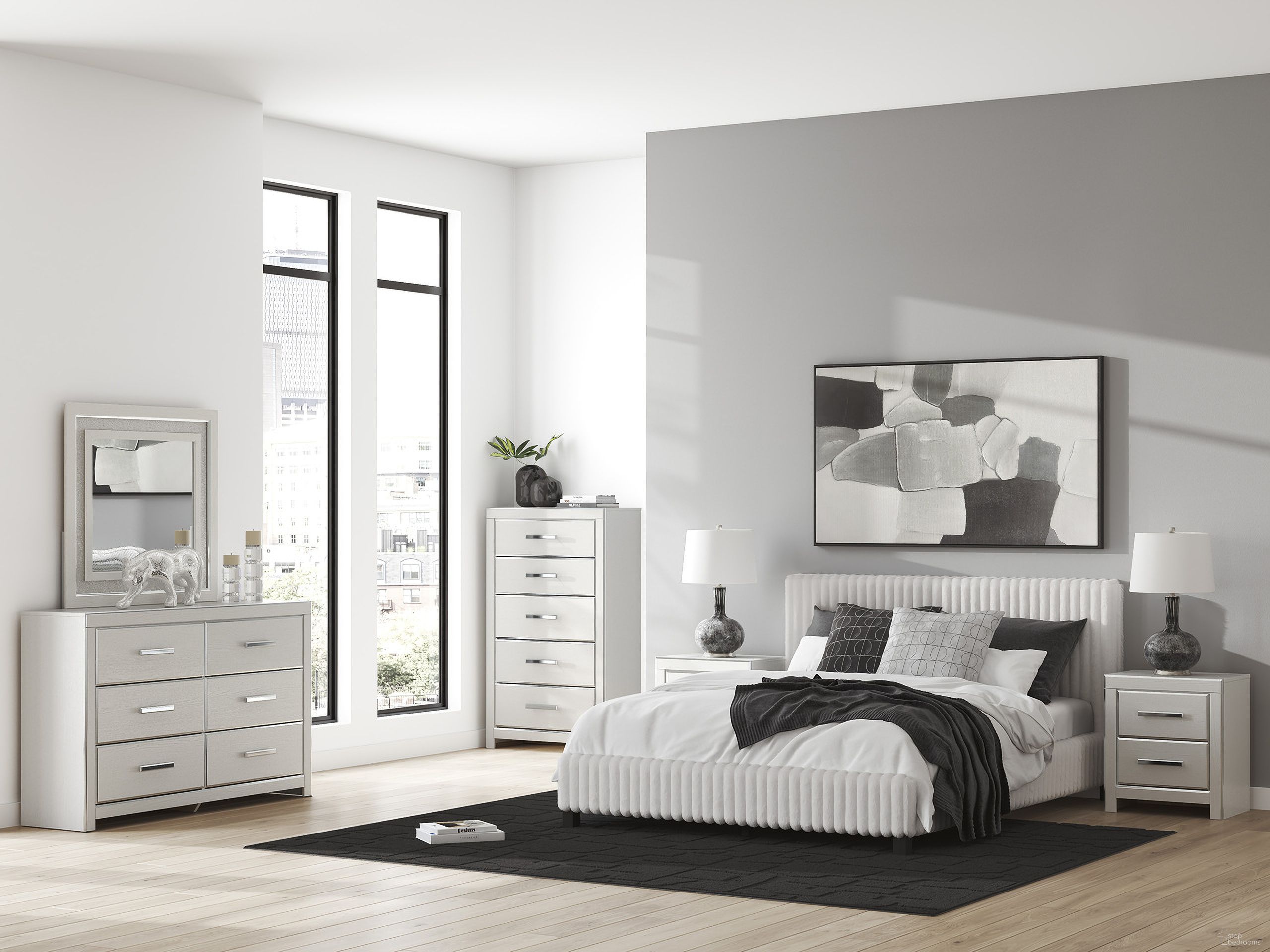 The appearance of Ravalori Upholstered Bedroom Set In White designed by Signature Design by Ashley in the modern / contemporary interior design. This white piece of furniture was selected by 1StopBedrooms from Ravalori Collection to add a touch of cosiness and style into your home. Sku: NCB3381-82;NCB3381-99;NCB3381-92. Material: Wood. Bed Size: California King.