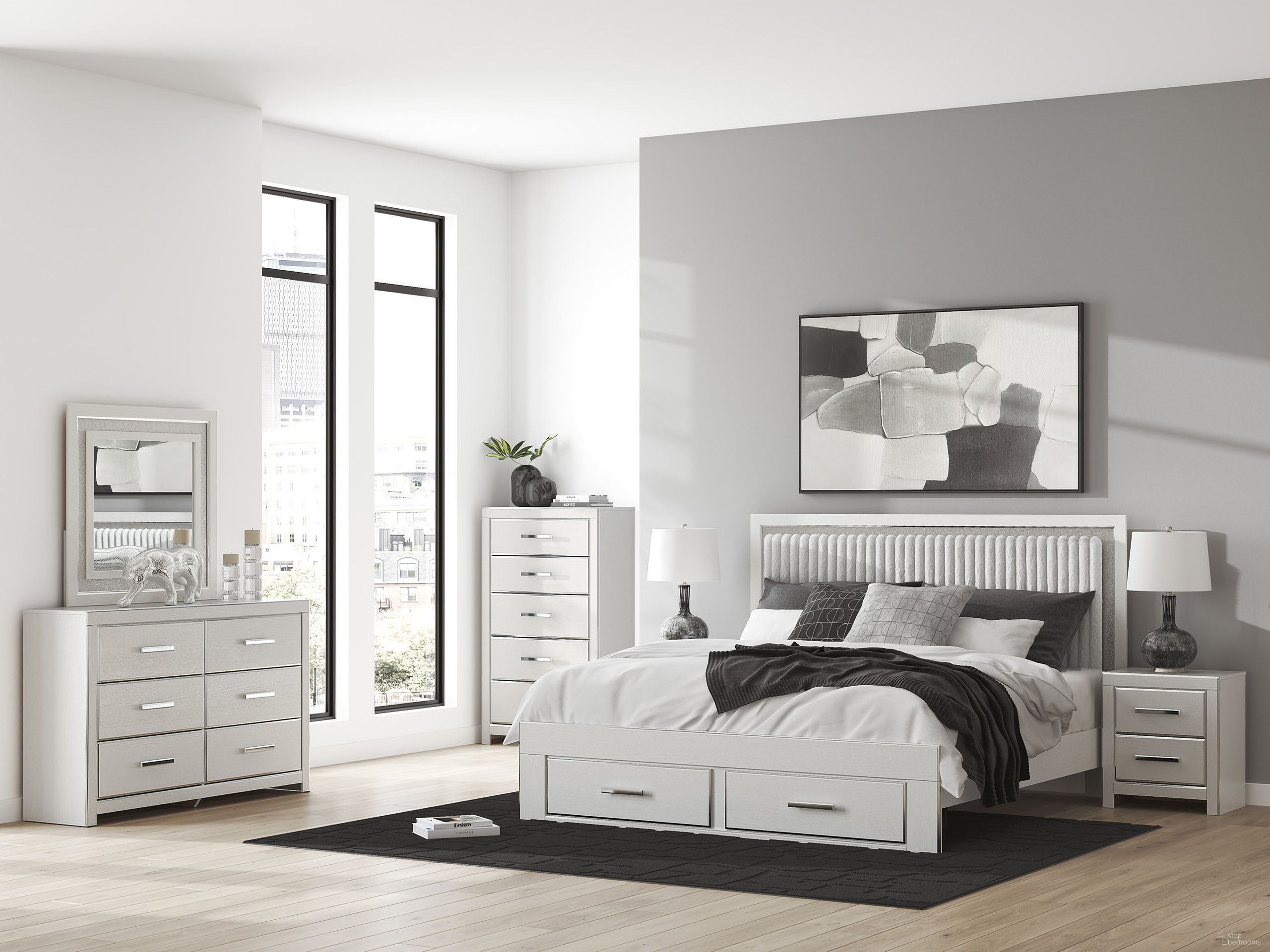 The appearance of Ravalori Upholstered Panel Platform Bedroom Set In White designed by Signature Design by Ashley in the modern / contemporary interior design. This white piece of furniture was selected by 1StopBedrooms from Ravalori Collection to add a touch of cosiness and style into your home. Sku: B100-13;NCB3381-54;NCB3381-57;NCB3381-95;NCB3381-92. Material: Wood. Bed Size: King.