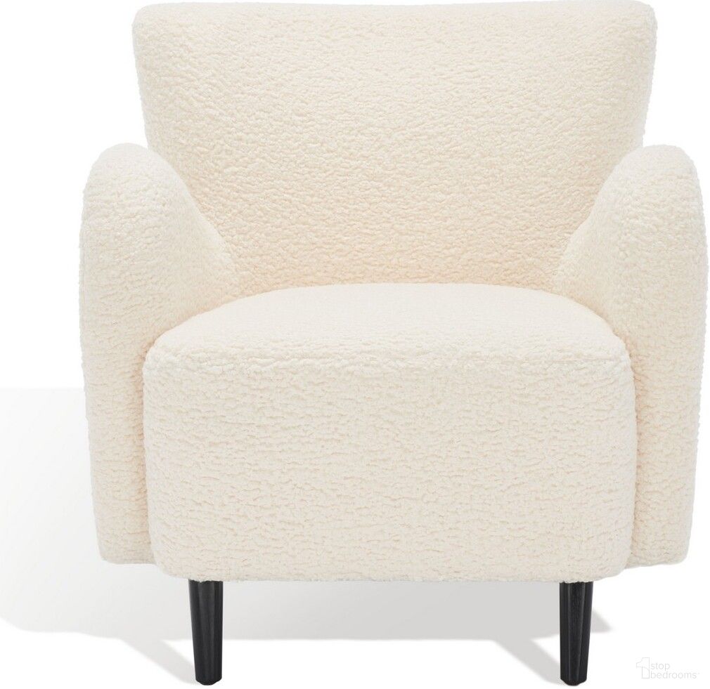 The appearance of Rayanne Modern Wingback Chair In Ivory designed by Safavieh Couture in the modern / contemporary interior design. This ivory piece of furniture  was selected by 1StopBedrooms from Rayanne Collection to add a touch of cosiness and style into your home. Sku: SFV5020A. Material: Wood.