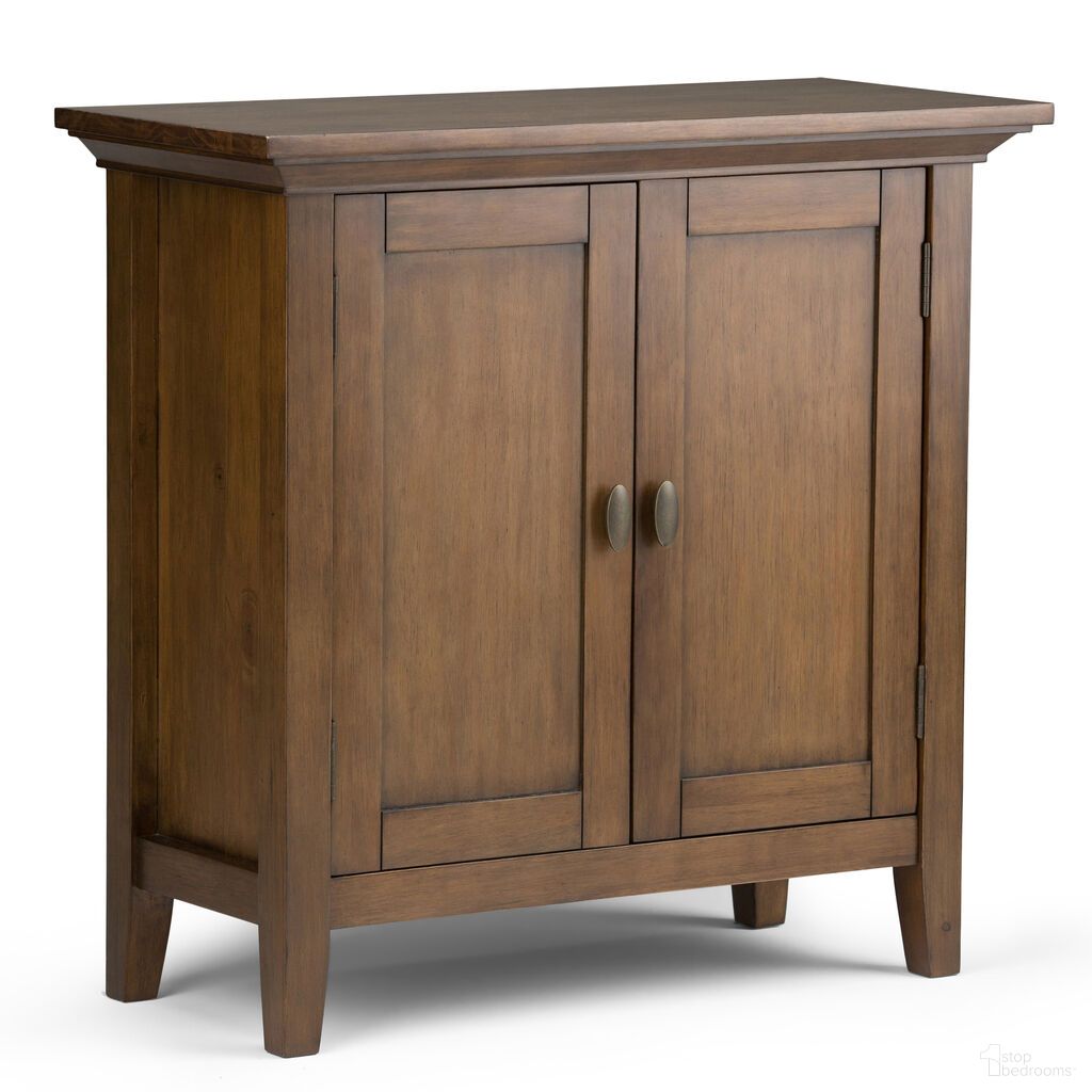 The appearance of Redmond Solid Wood Low Storage Cabinet In Rustic Natural Aged Brown designed by Simpli Home in the transitional interior design. This rustic natural aged brown piece of furniture was selected by 1StopBedrooms from Redmond Collection to add a touch of cosiness and style into your home. Sku: 3AXCADM-04. Material: Pine.