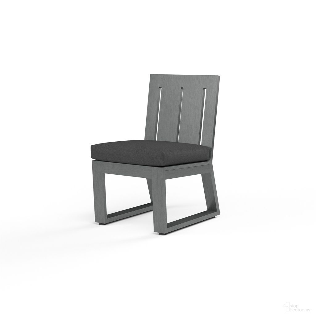 The appearance of Redondo Armless Dining Chair in Spectrum Carbon designed by Sunset West in the modern / contemporary interior design. This spectrum carbon piece of furniture was selected by 1StopBedrooms from Redondo Collection to add a touch of cosiness and style into your home. Sku: SW3801-1A-48085. Material: Aluminum.