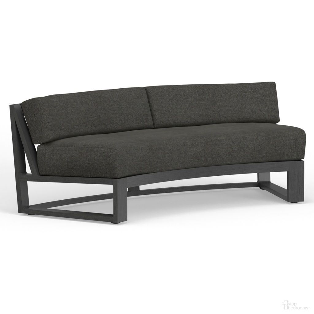 The appearance of Redondo Curved Sofa in Spectrum Carbon designed by Sunset West in the modern / contemporary interior design. This spectrum carbon piece of furniture was selected by 1StopBedrooms from Redondo Collection to add a touch of cosiness and style into your home. Sku: SW3801-CRV-48085. Material: Aluminum.