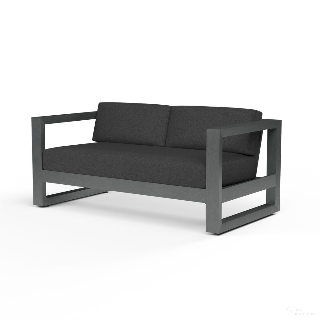The appearance of Redondo Loveseat in Spectrum Carbon designed by Sunset West in the modern / contemporary interior design. This spectrum carbon piece of furniture was selected by 1StopBedrooms from Redondo Collection to add a touch of cosiness and style into your home. Sku: SW3801-22-48085. Material: Aluminum.