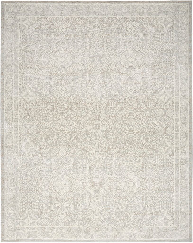 The appearance of Renewed 9' x 12' Indoor Rug In Ivory and Silver designed by Nourison in the rustic / southwestern interior design. This ivory and silver piece of furniture was selected by 1StopBedrooms from Renewed Collection to add a touch of cosiness and style into your home. Sku: 99446991171. Material: Polyester.