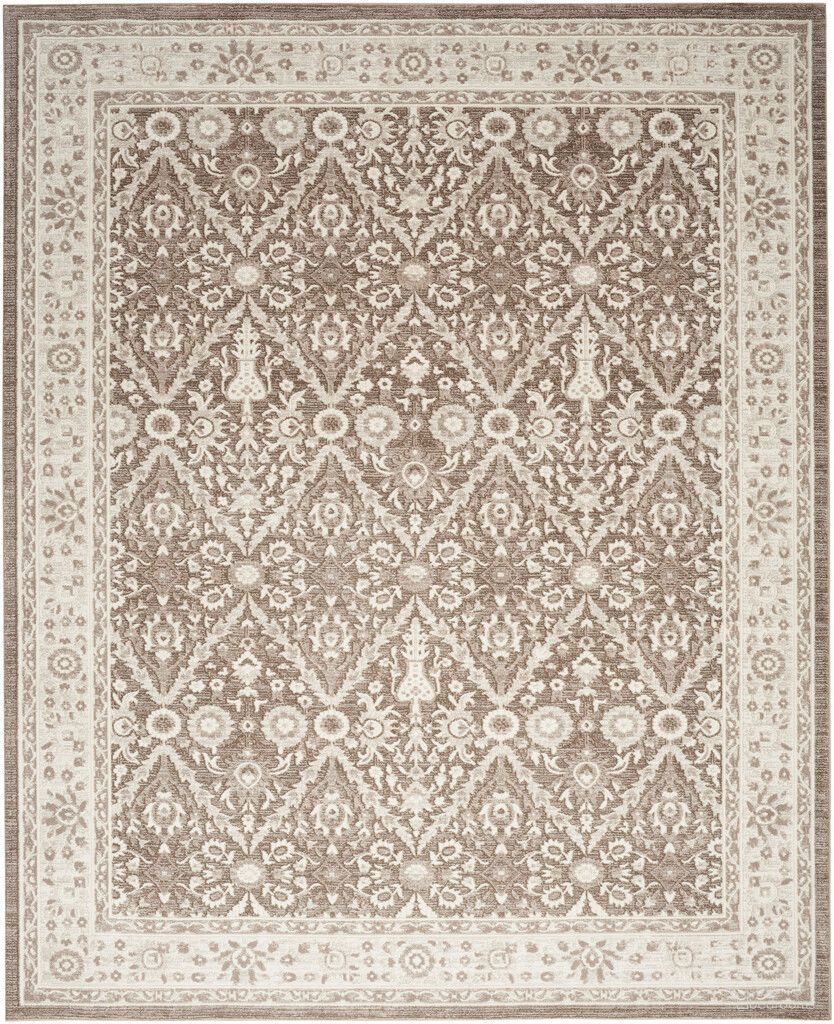 The appearance of Renewed 9' x 12' Indoor Rug In Mocha and Ivory designed by Nourison in the rustic / southwestern interior design. This mocha and ivory piece of furniture  was selected by 1StopBedrooms from Renewed Collection to add a touch of cosiness and style into your home. Sku: 99446991560. Material: Polyester.