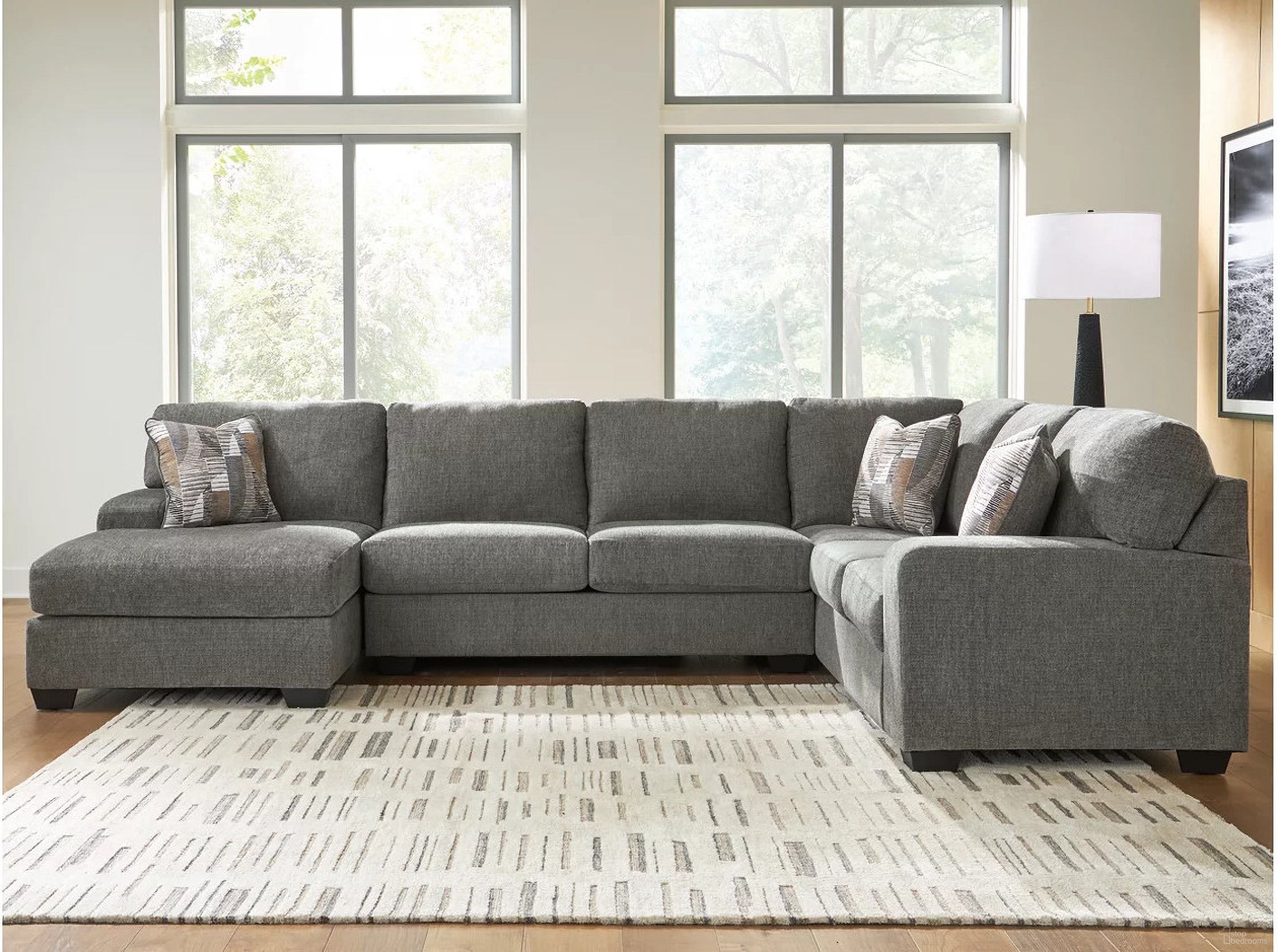 The appearance of Revenna 3-Piece LAF Sectional with Chaise In Greystone designed by Signature Design by Ashley in the modern / contemporary interior design. This greystone piece of furniture was selected by 1StopBedrooms from Revenna Collection to add a touch of cosiness and style into your home. Sku: NC4840516;NC4840534;NC4840549. Material: Polyester. Orientation: LAF.