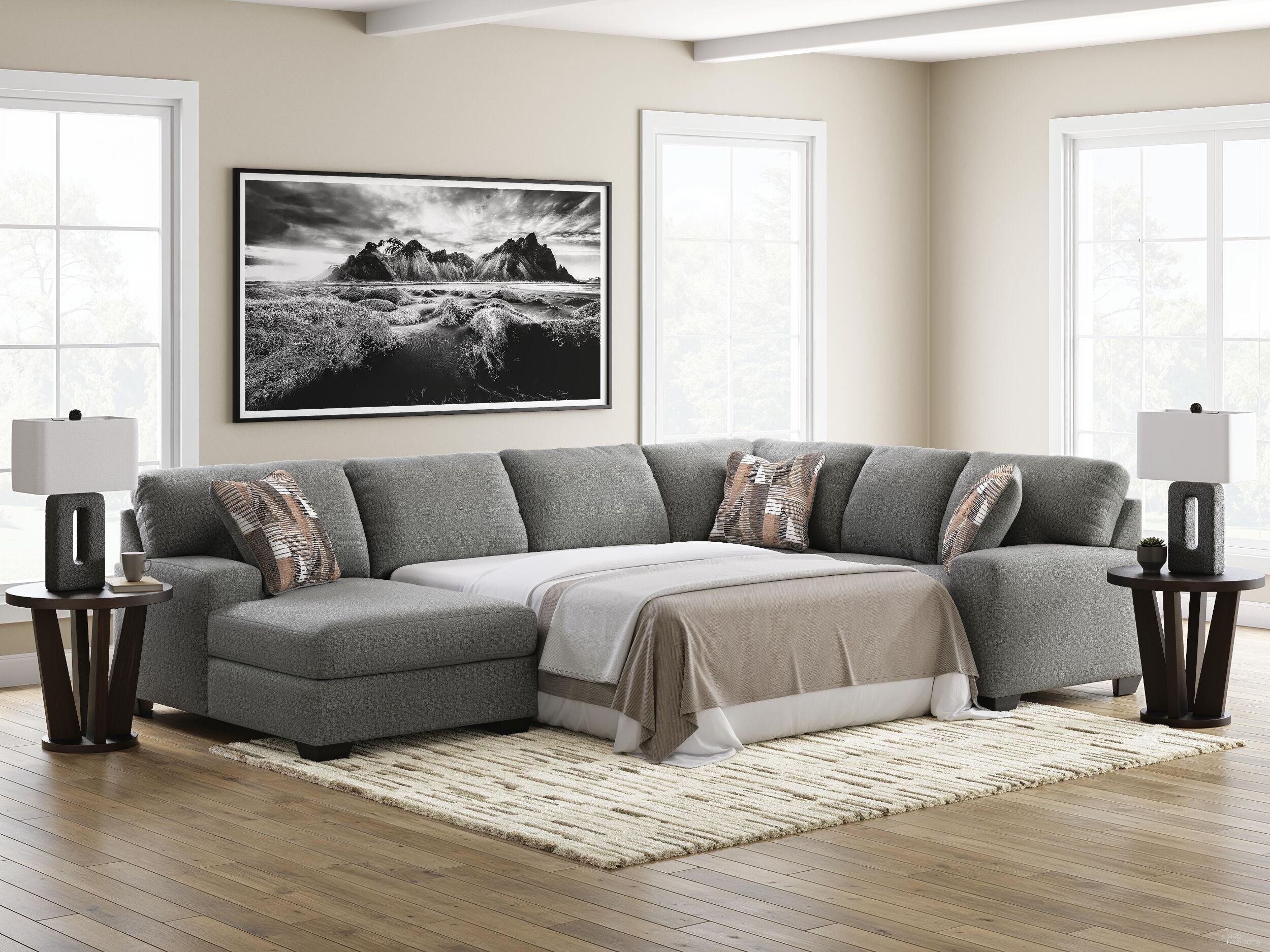The appearance of Revenna 3-Piece LAF Sleeper Sectional with Chaise In Greystone designed by Signature Design by Ashley in the modern / contemporary interior design. This greystone piece of furniture was selected by 1StopBedrooms from Revenna Collection to add a touch of cosiness and style into your home. Sku: NC4840516;NC4840549;NC4840571. Material: Polyester. Orientation: LAF.