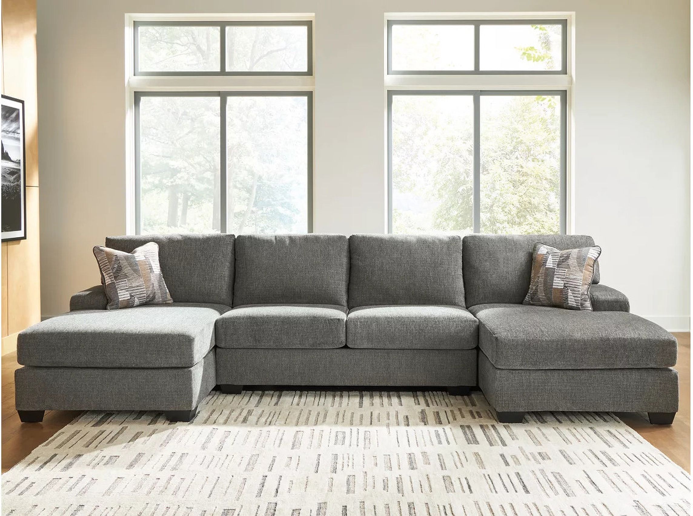 The appearance of Revenna 3-Piece Sectional with Double Chaise In Greystone designed by Signature Design by Ashley in the modern / contemporary interior design. This greystone piece of furniture was selected by 1StopBedrooms from Revenna Collection to add a touch of cosiness and style into your home. Sku: NC4840516;NC4840517;NC4840534. Material: Polyester. Layout: U-Shape.